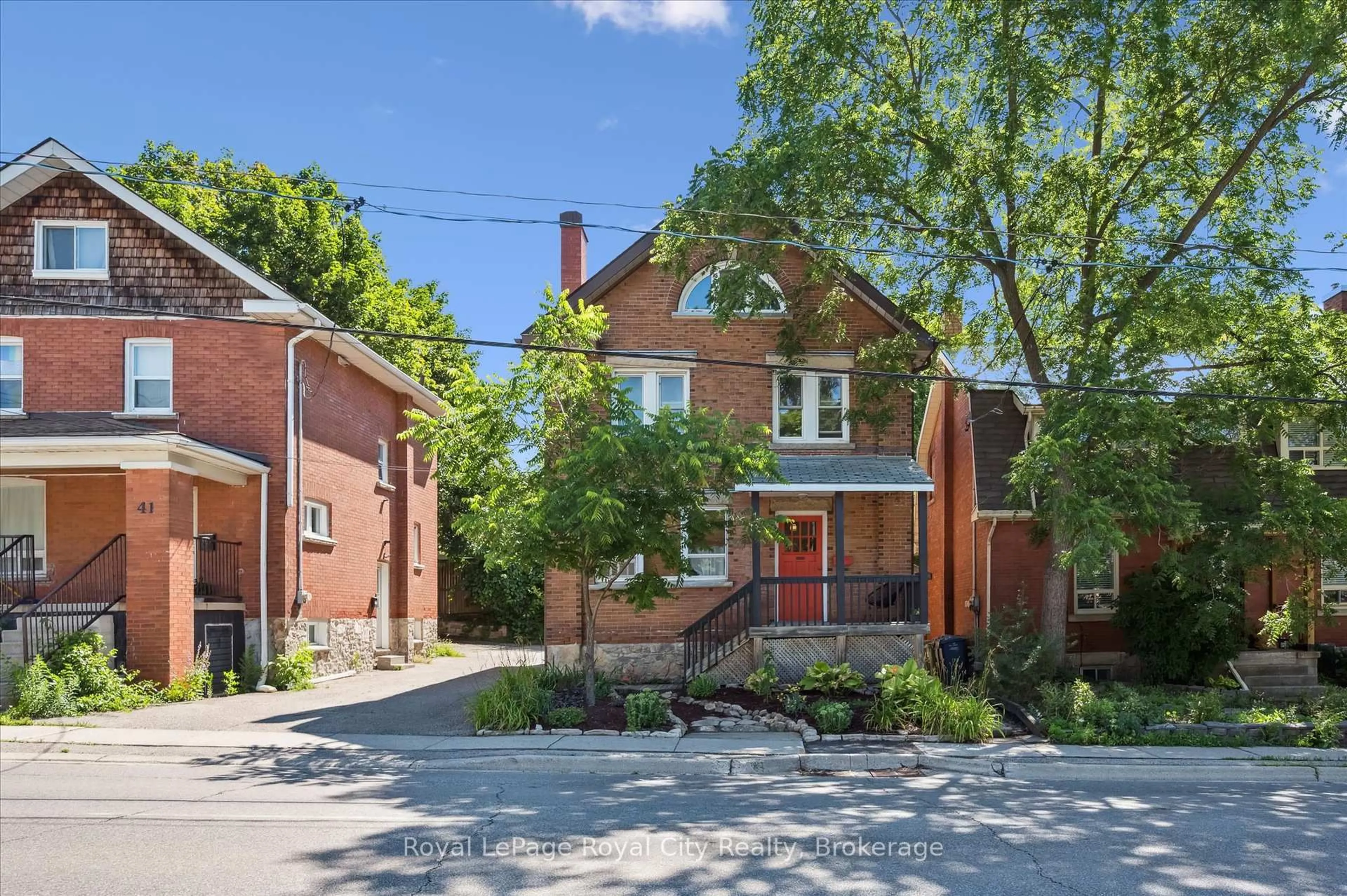 Home with brick exterior material, street for 33 Eramosa Rd, Guelph Ontario N1E 2L4