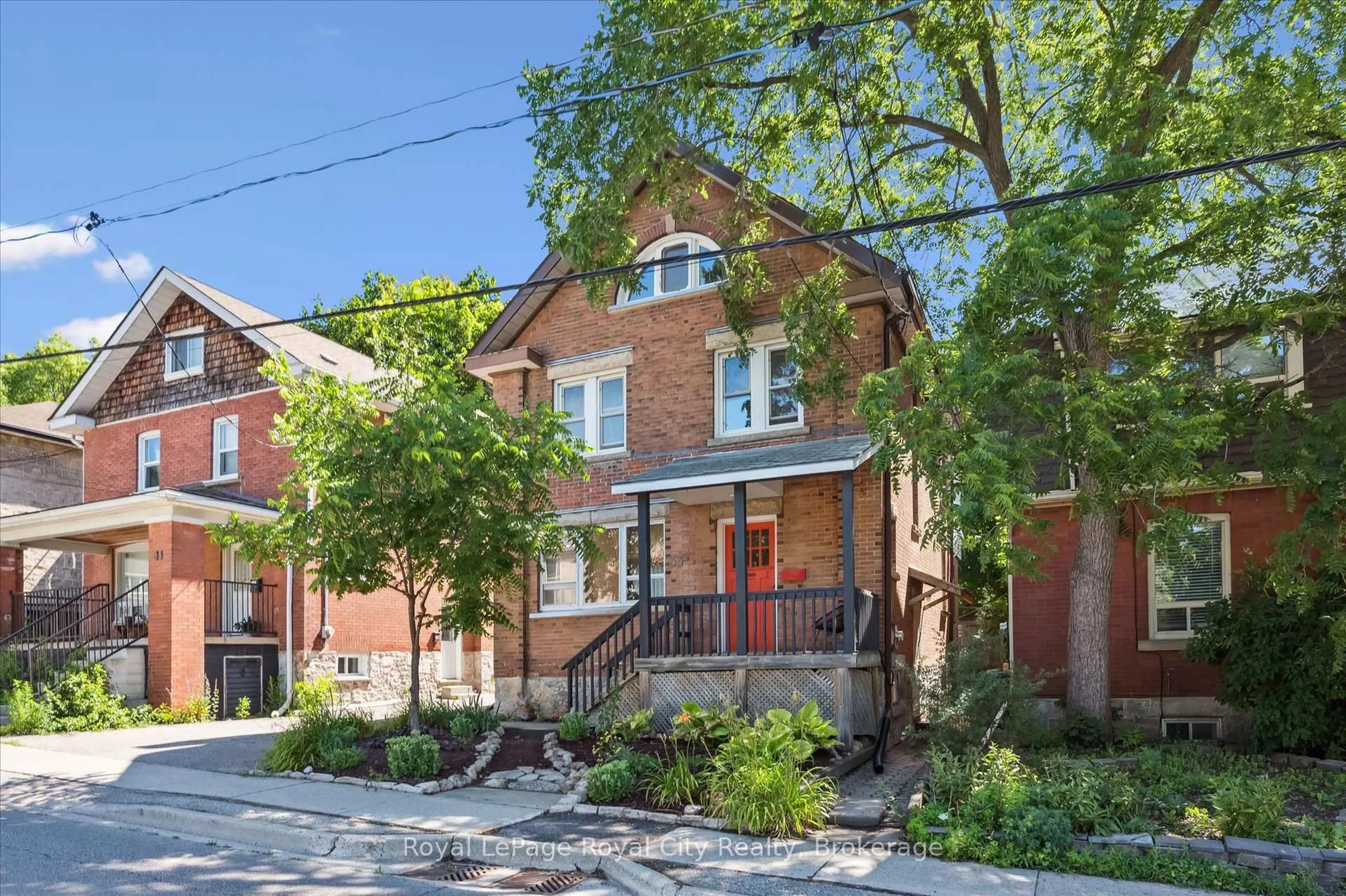 Home with brick exterior material, street for 33 Eramosa Rd, Guelph Ontario N1E 2L4