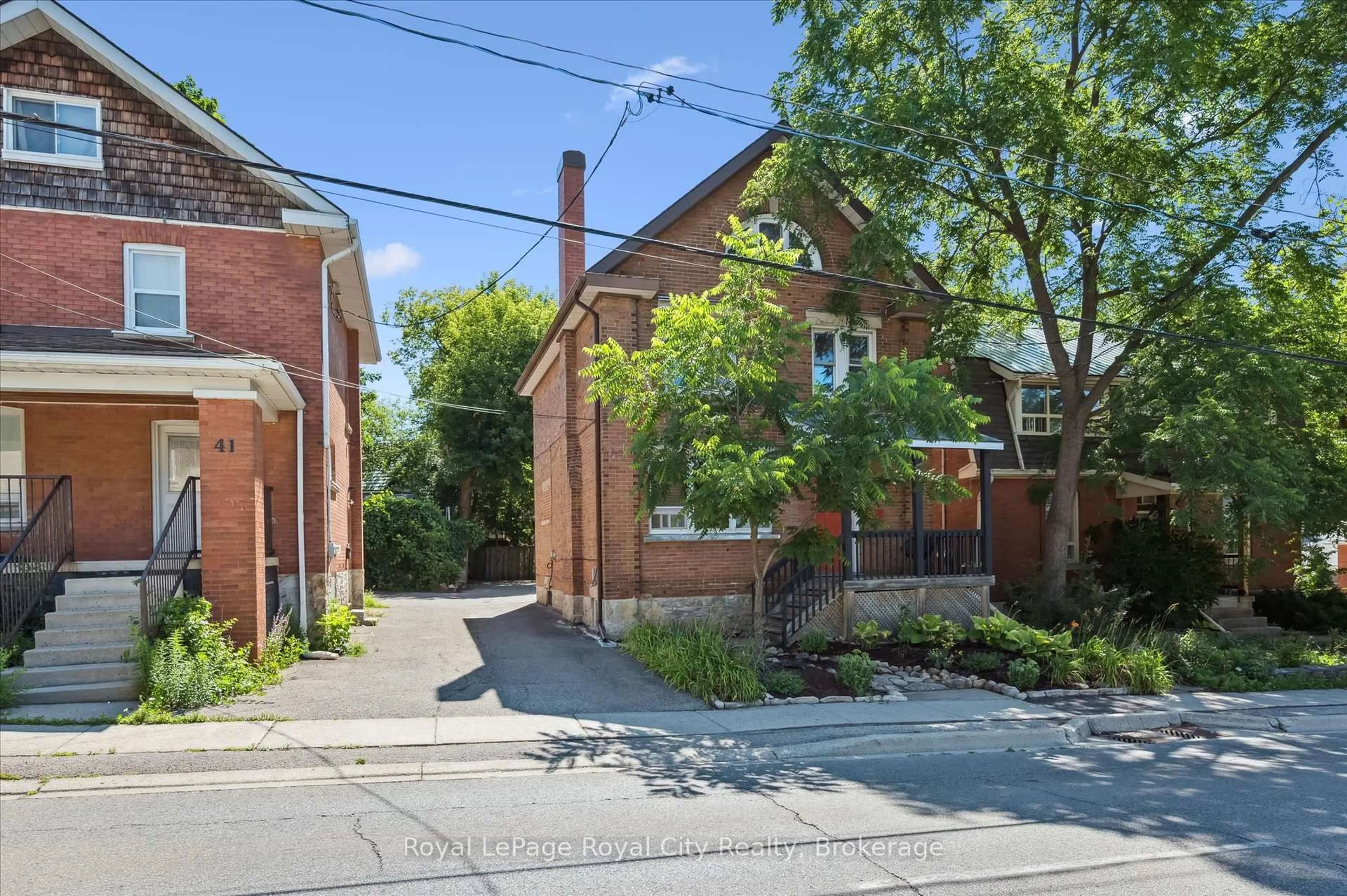 Home with brick exterior material, street for 33 Eramosa Rd, Guelph Ontario N1E 2L4
