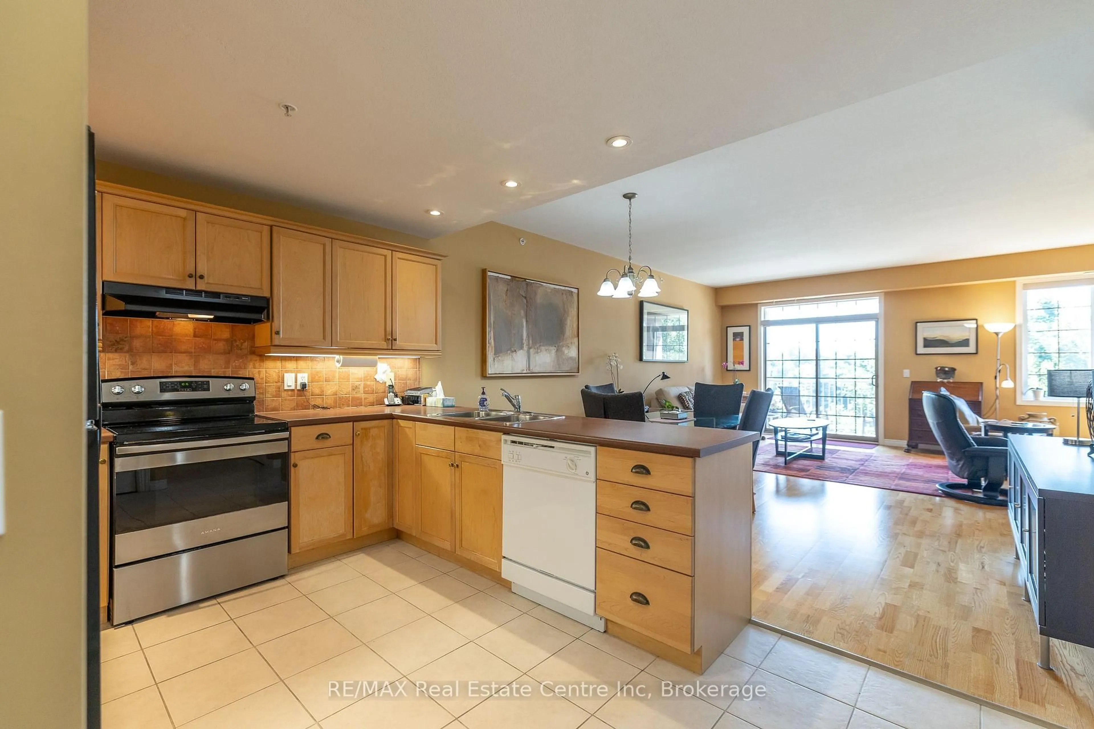 Open concept kitchen, ceramic/tile floor for 20 Station Sq #303, Centre Wellington Ontario N0B 1S0