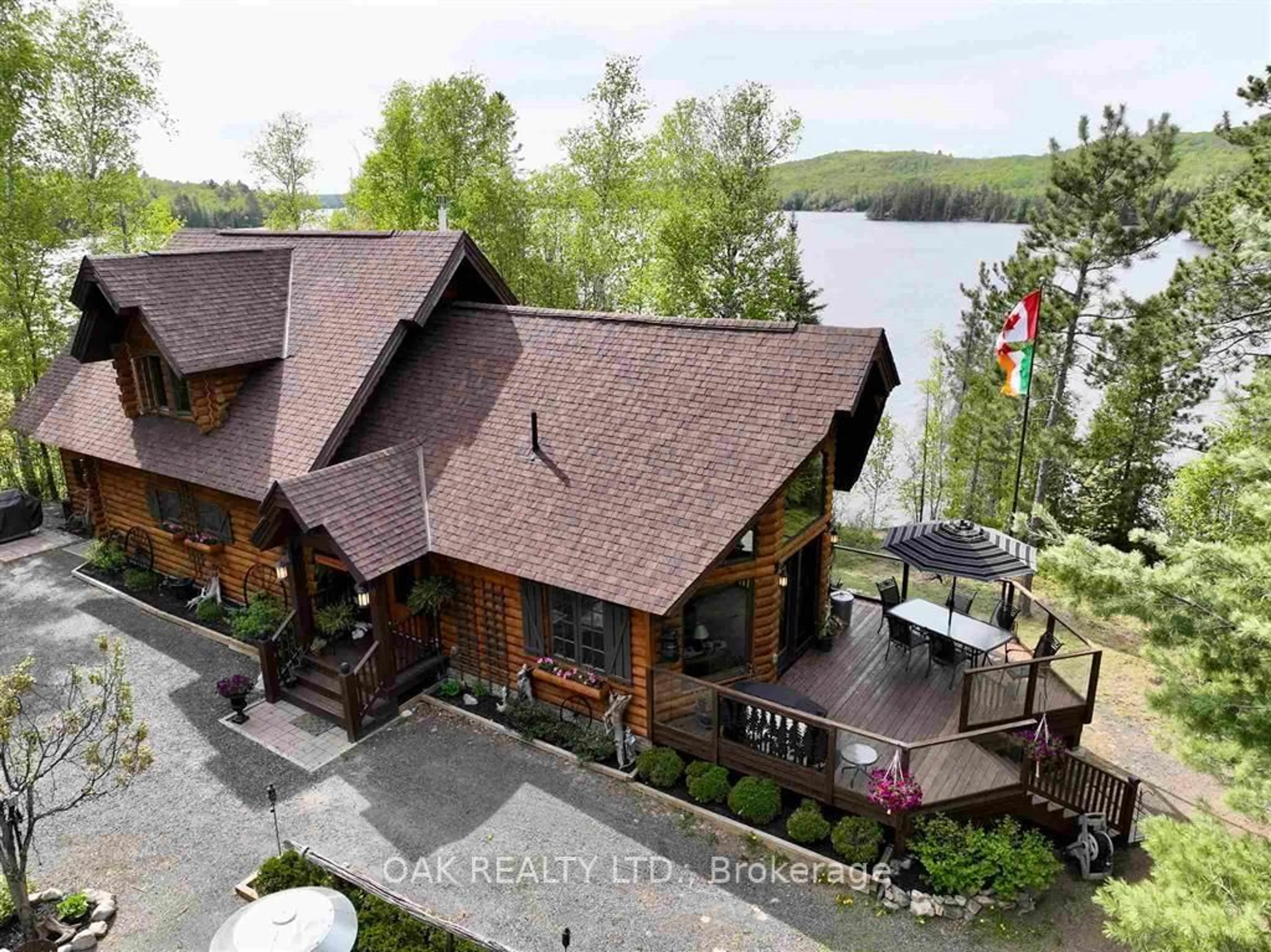 A pic from outside/outdoor area/front of a property/back of a property/a pic from drone, water/lake/river/ocean view for 28 Beaver Pond Rd, Elliot Lake Ontario P5A 2S9