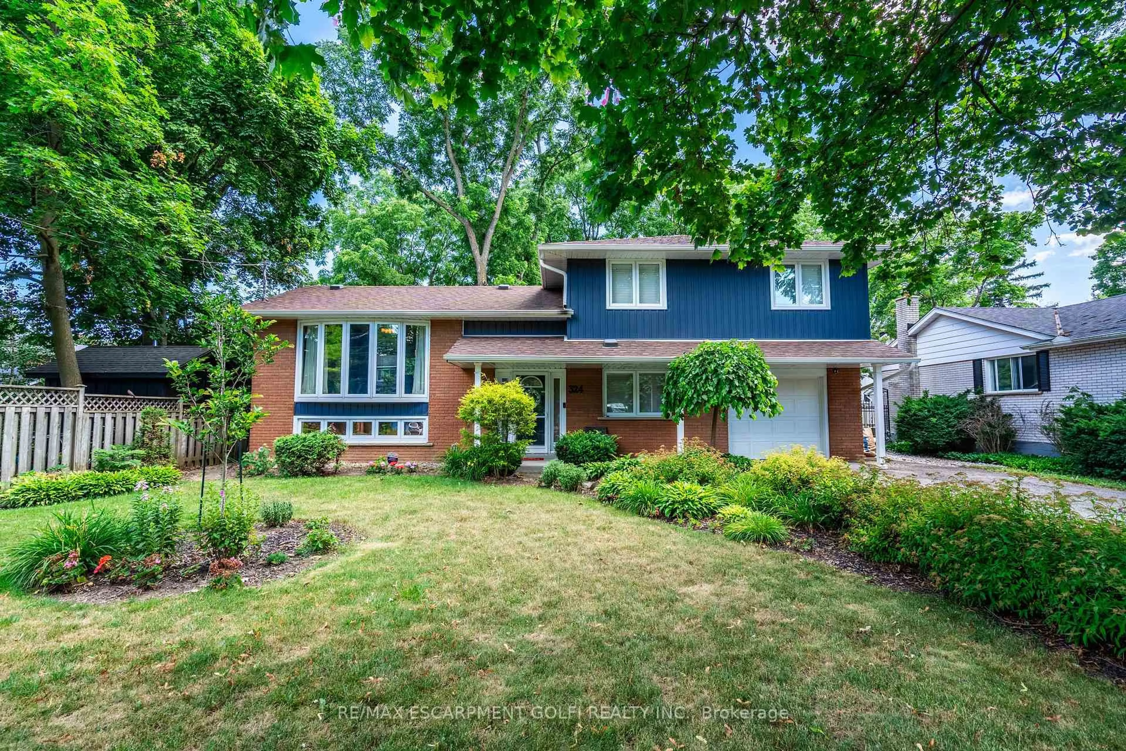 Home with brick exterior material, street for 324 Parkside Dr, Hamilton Ontario L0R 2H0