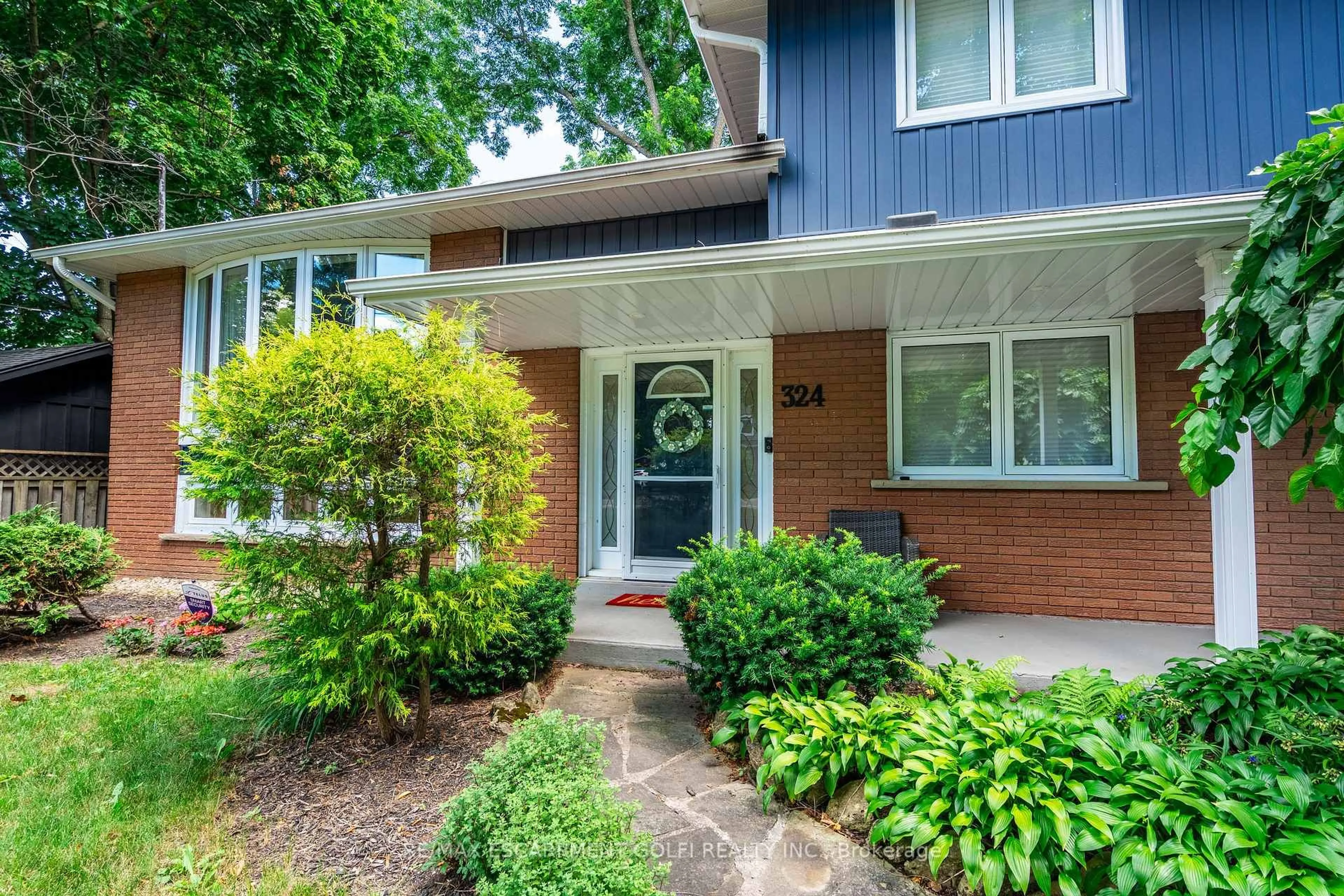 Home with brick exterior material, street for 324 Parkside Dr, Hamilton Ontario L0R 2H0