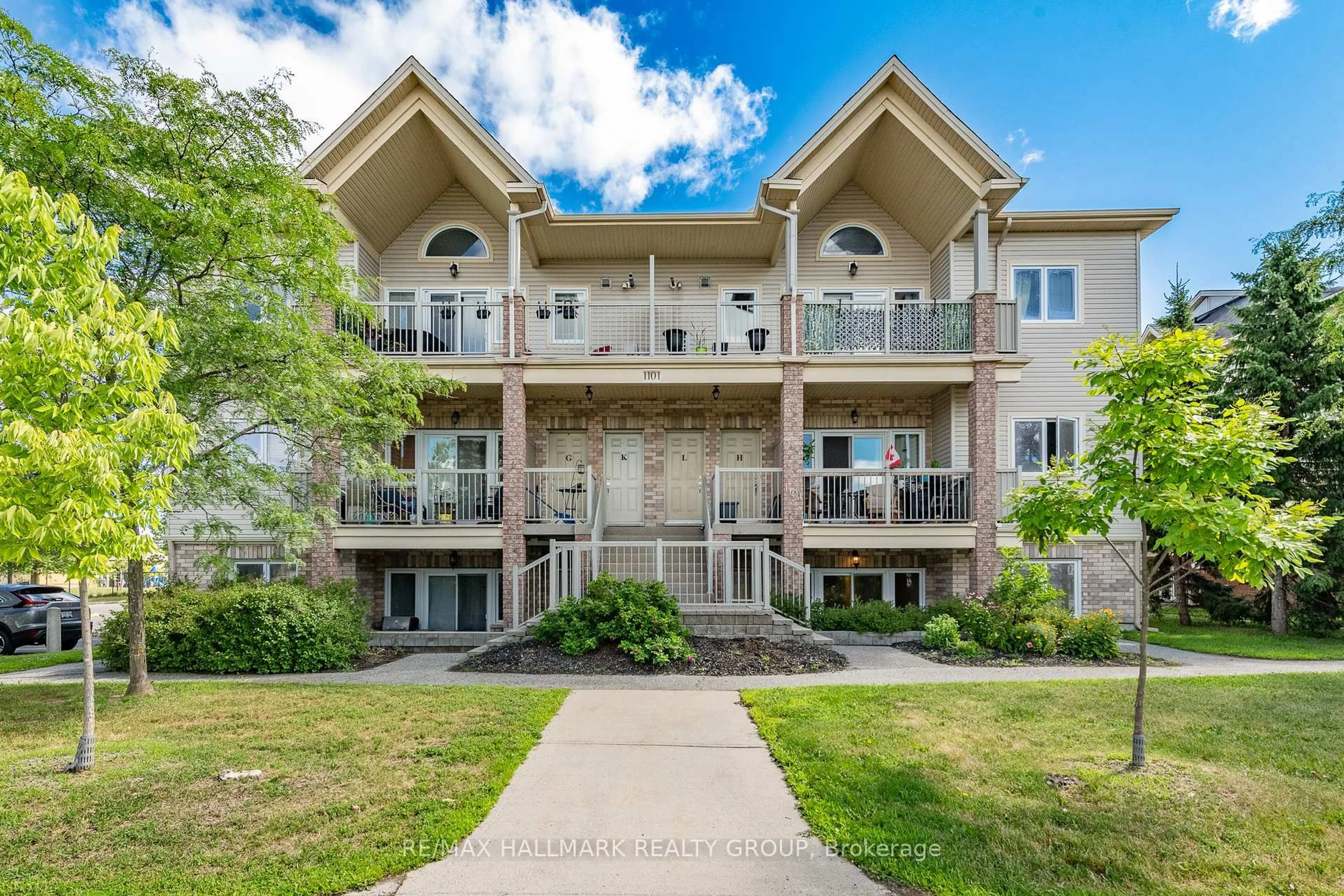 A pic from outside/outdoor area/front of a property/back of a property/a pic from drone, water/lake/river/ocean view for 1101 Stittsville Main St #D, Stittsville Ontario K2S 0C7