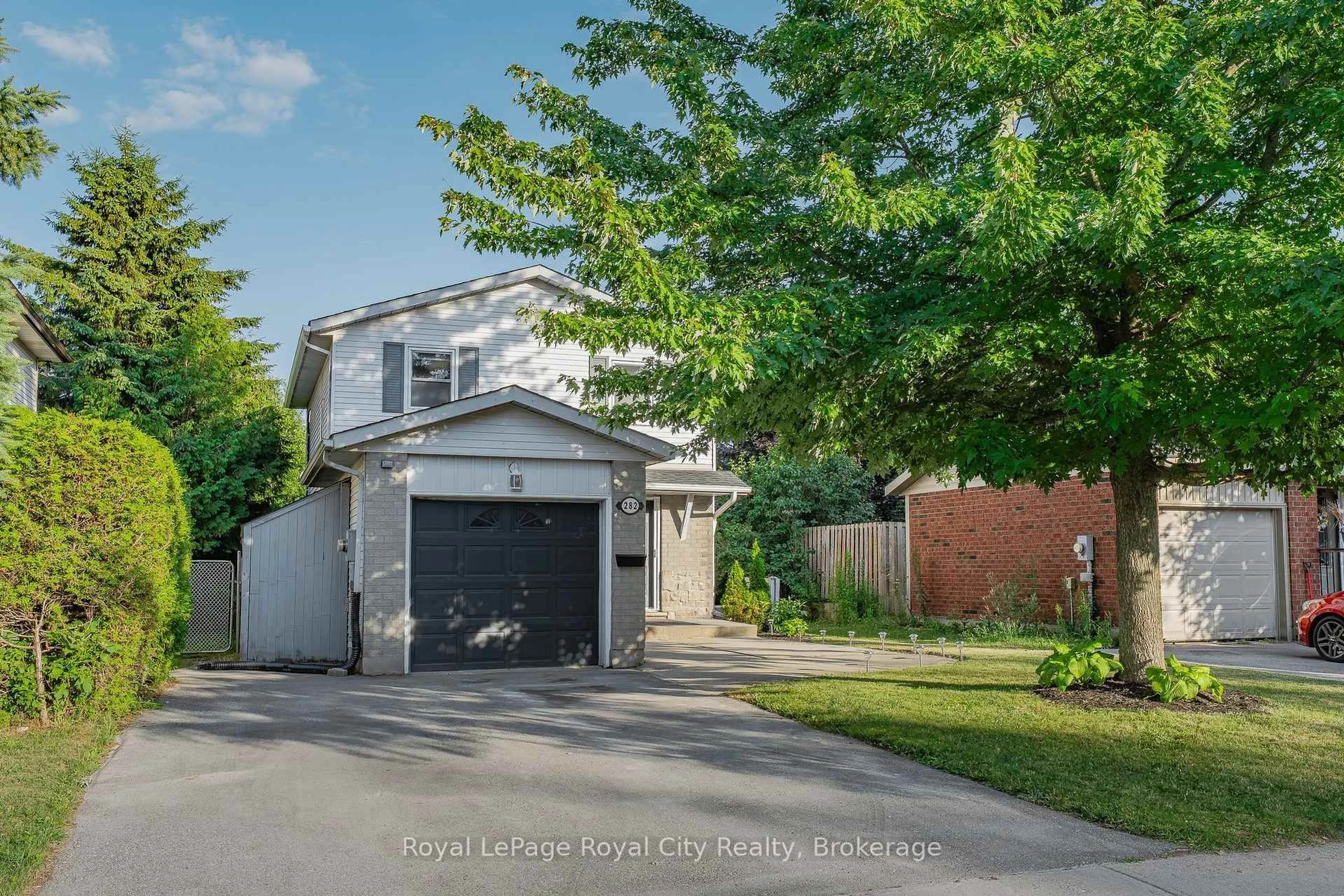 A pic from outside/outdoor area/front of a property/back of a property/a pic from drone, street for 282 Strathallan St, Centre Wellington Ontario N1M 3L5