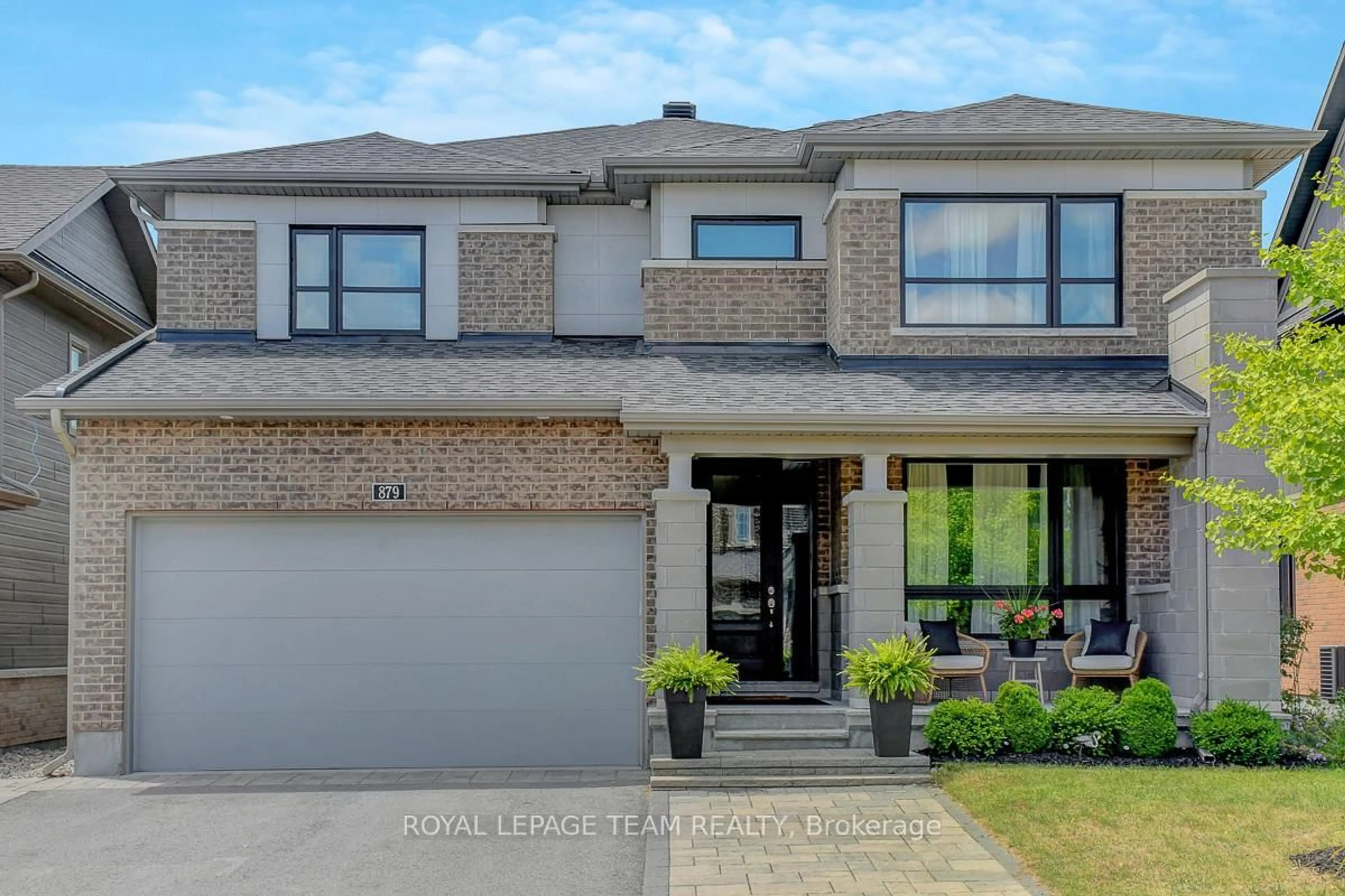Home with brick exterior material, street for 879 Percival Cres, Manotick Ontario K4M 0G3