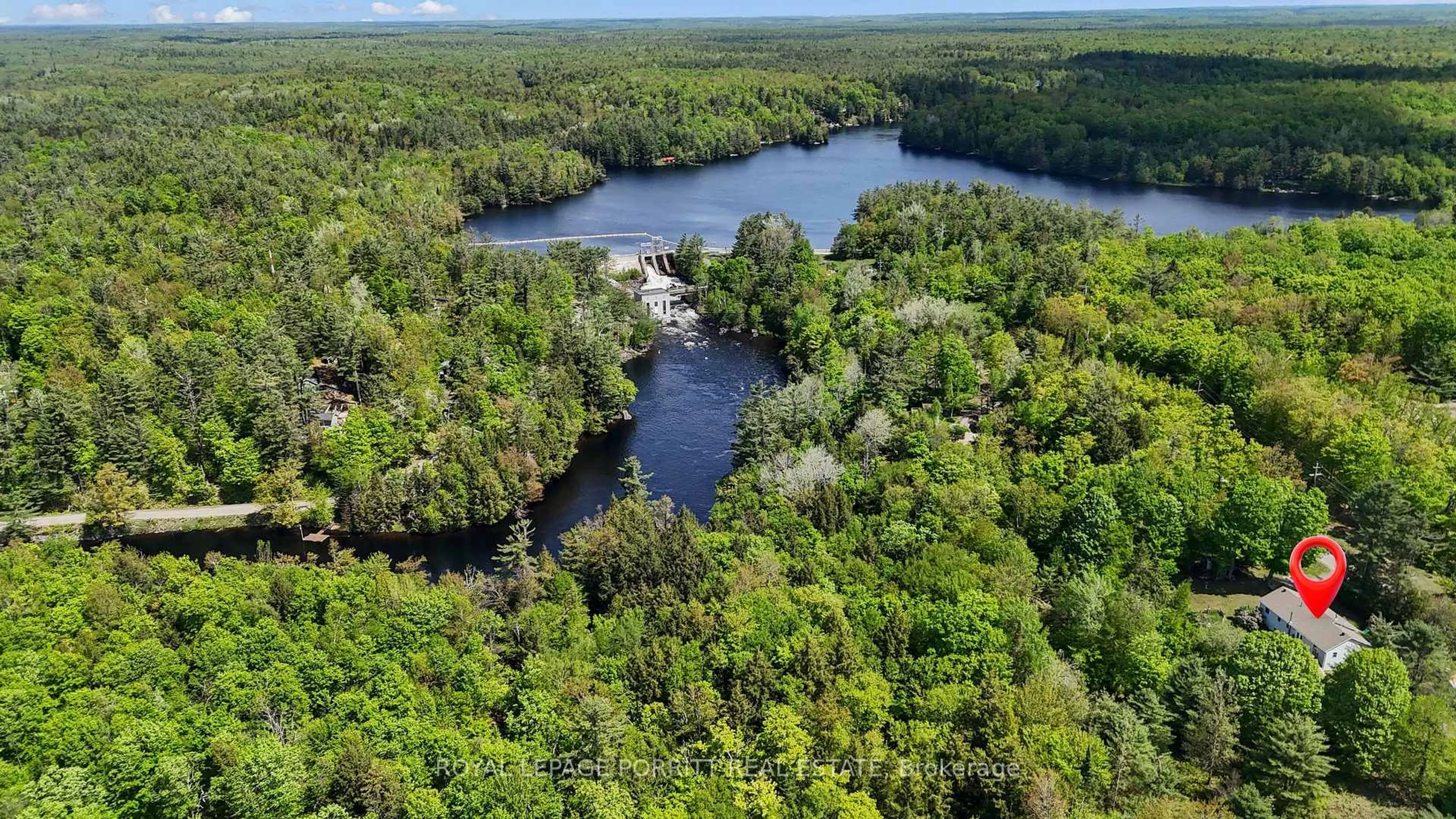 A pic from outside/outdoor area/front of a property/back of a property/a pic from drone, water/lake/river/ocean view for 1101 Hawn Rd, Bracebridge Ontario P1L 1X1