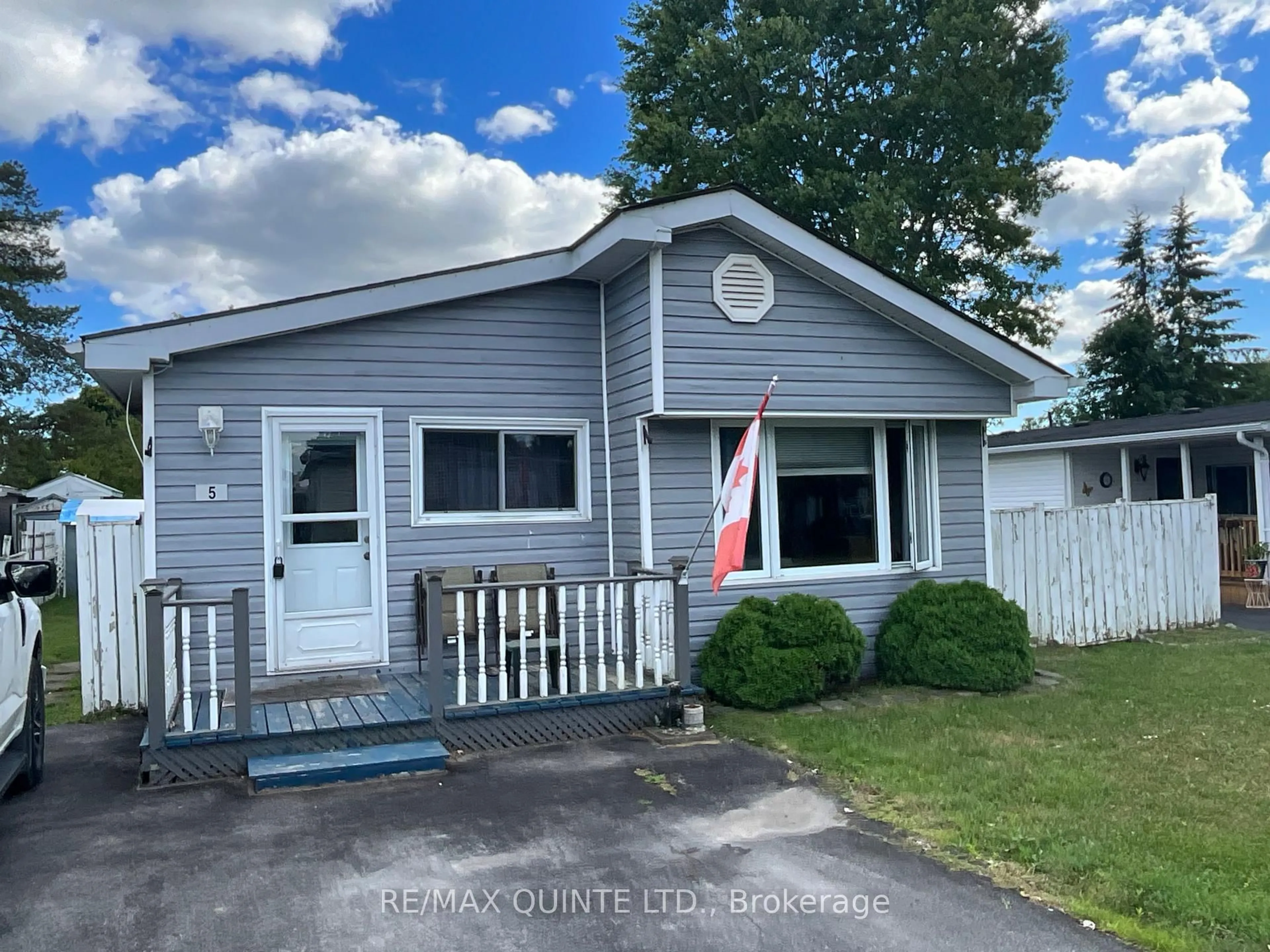 Home with vinyl exterior material, street for 5 Oriole Lane, Quinte West Ontario K8M 4Z3