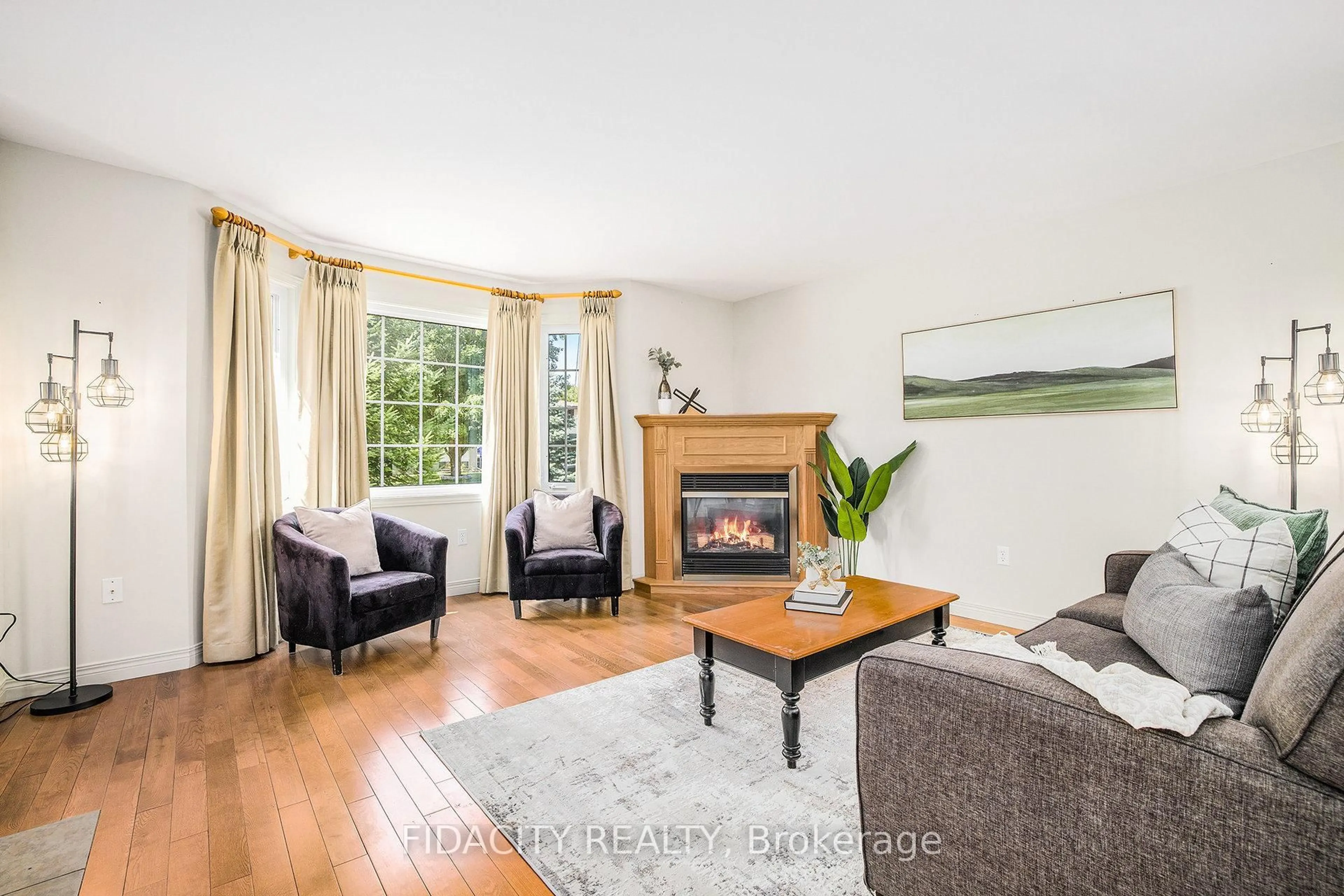 Living room with furniture, wood/laminate floor for 616 Clothier St, North Grenville Ontario K0G 1J0