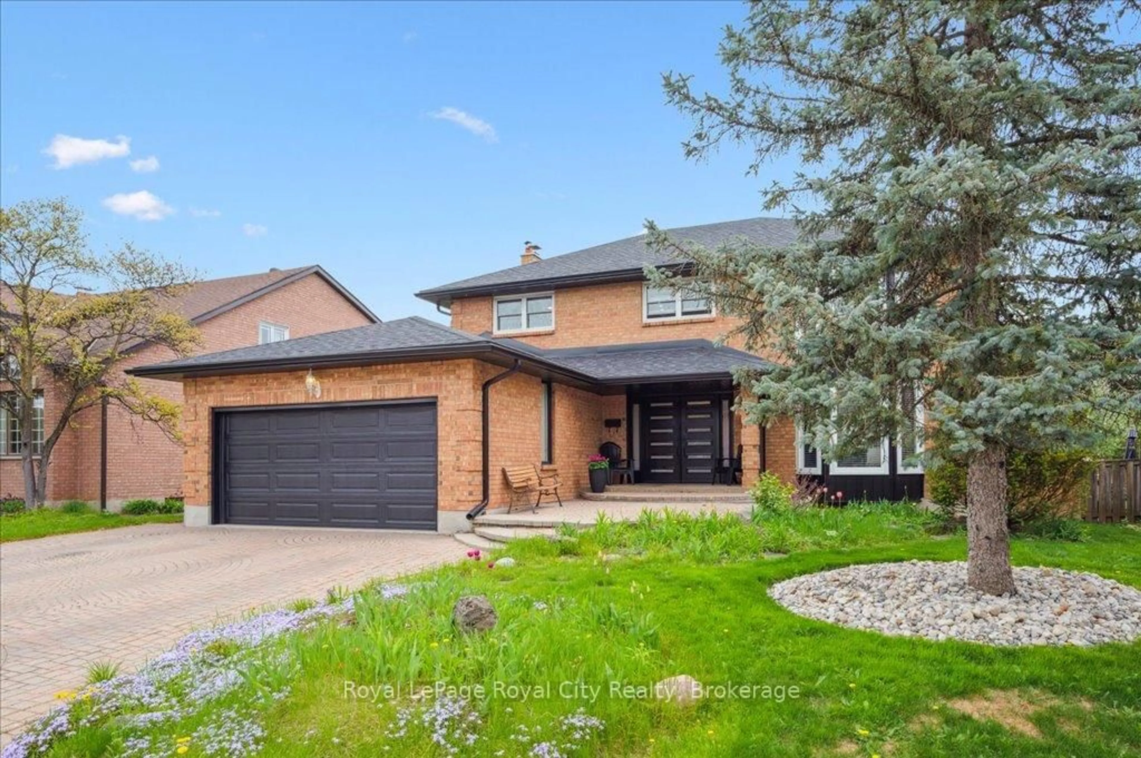 Home with brick exterior material, street for 9 Kortright Rd, Guelph Ontario N1G 4C8