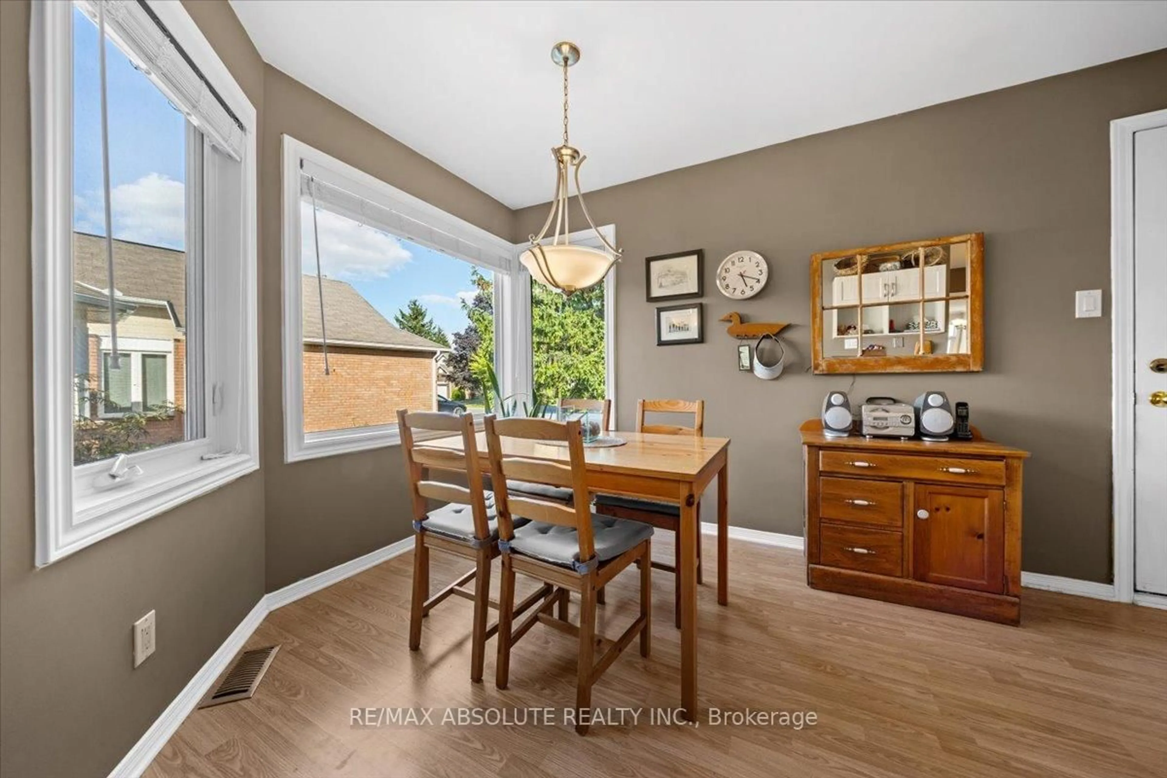 Dining room, wood/laminate floor for 8 Pine Needles Crt, Ottawa Ontario K2S 1G5