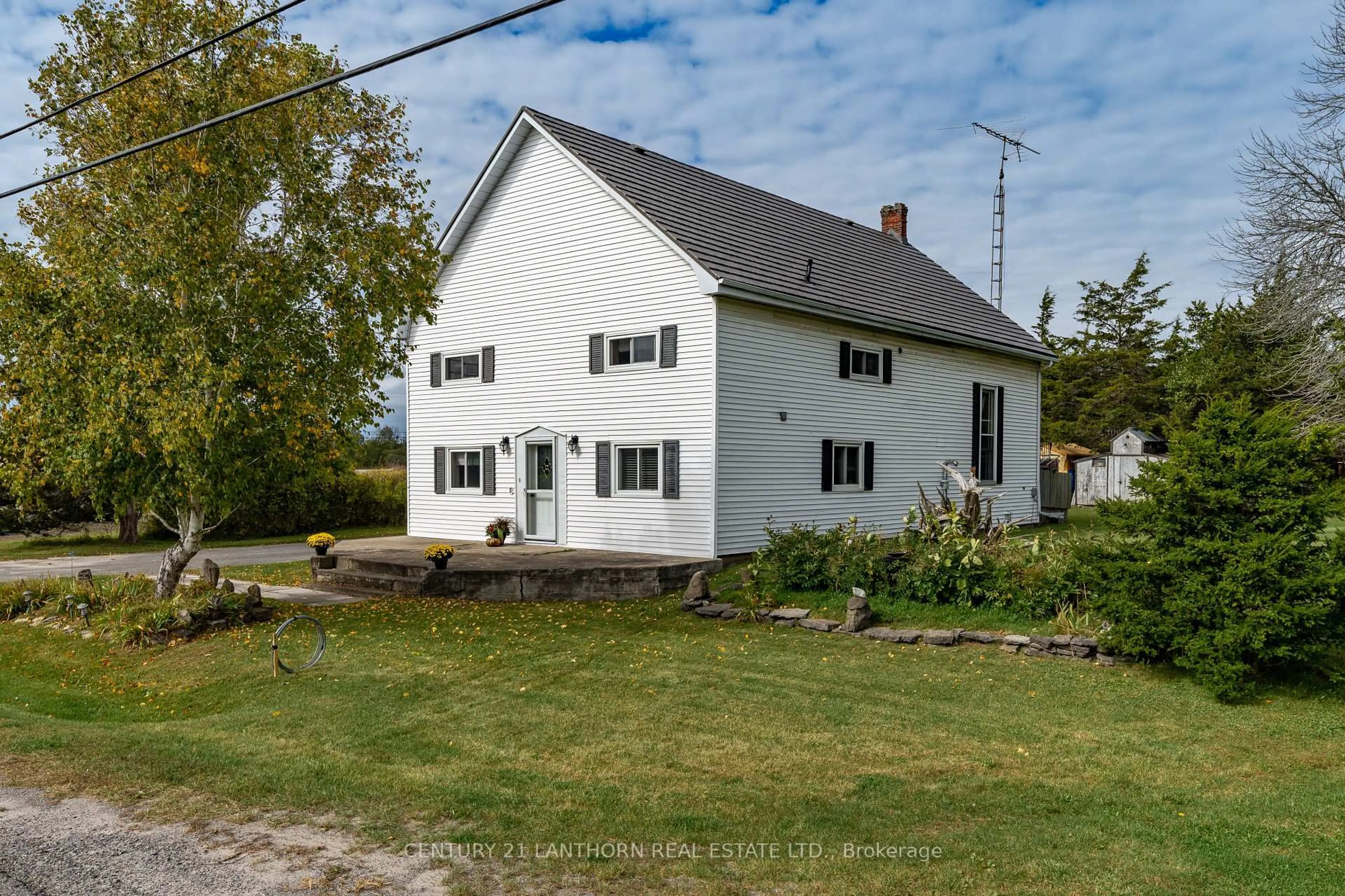 A pic from outside/outdoor area/front of a property/back of a property/a pic from drone, street for 1868 County Road 14 Rd, Prince Edward County Ontario K0K 1A0