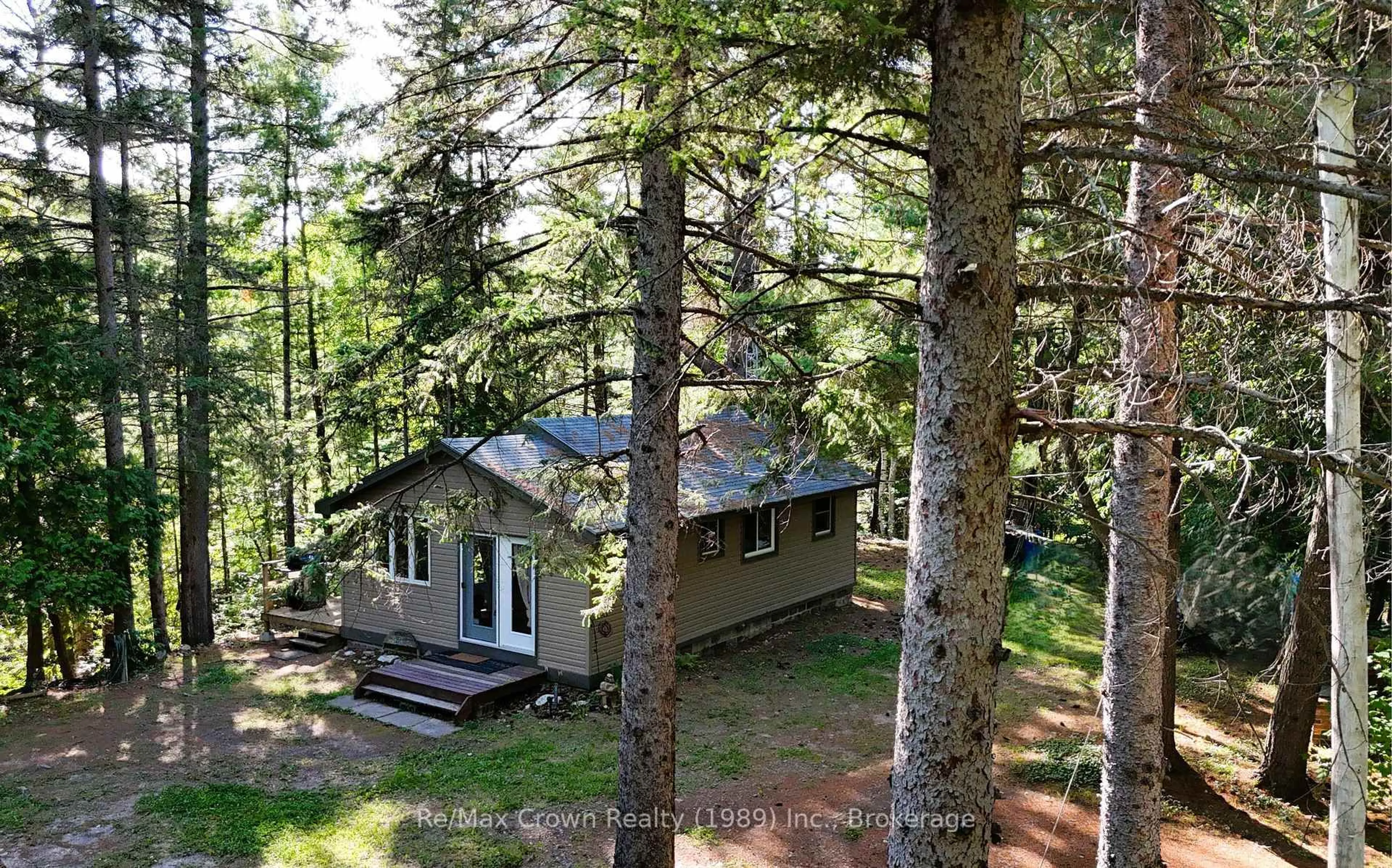 A pic from outside/outdoor area/front of a property/back of a property/a pic from drone, forest/trees view for 287 Chapman's Landing Rd Rd, Nipissing Ontario P0H 1W0