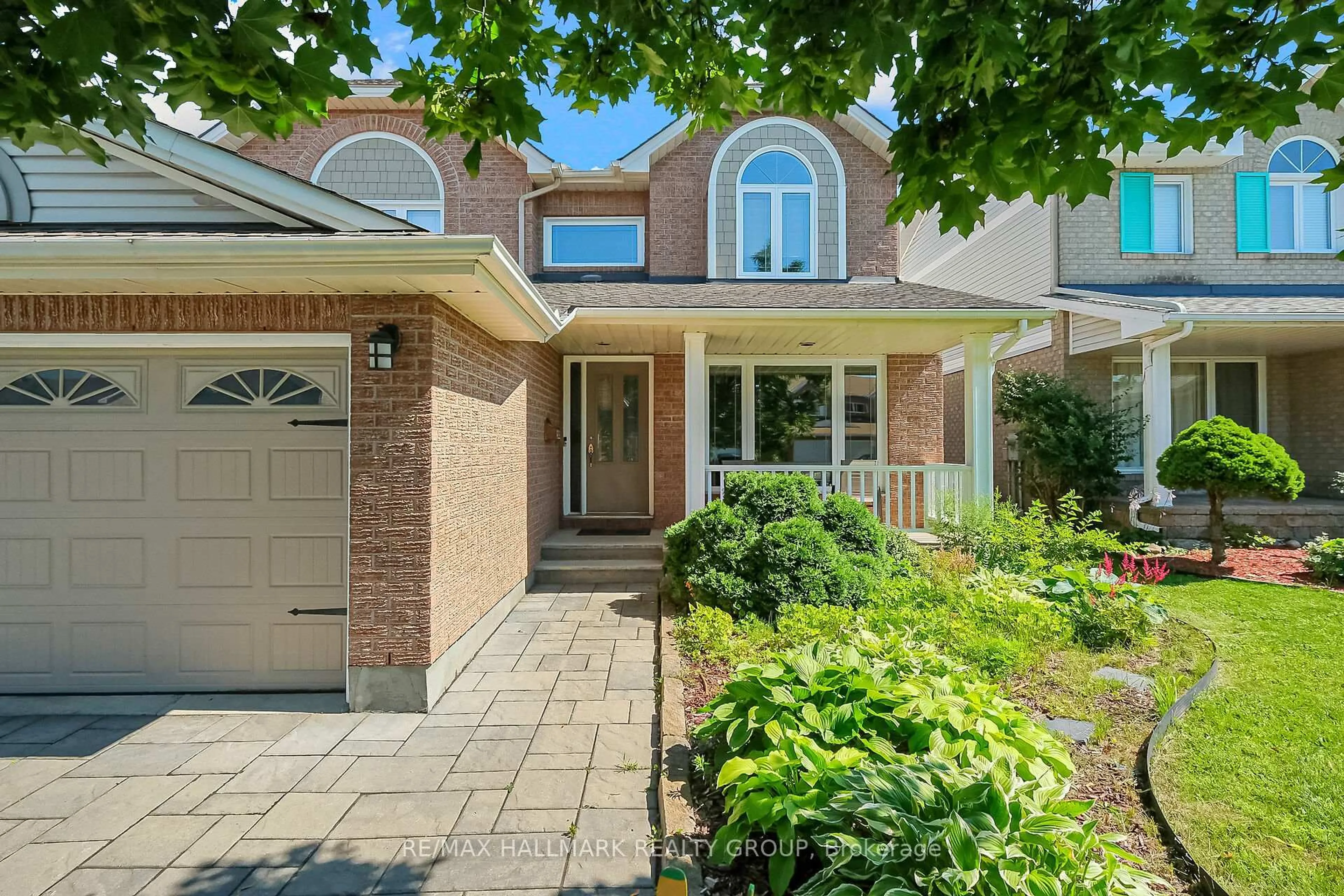 Home with brick exterior material, street for 3034 Courtyard Cres, Ottawa Ontario K1T 3R7