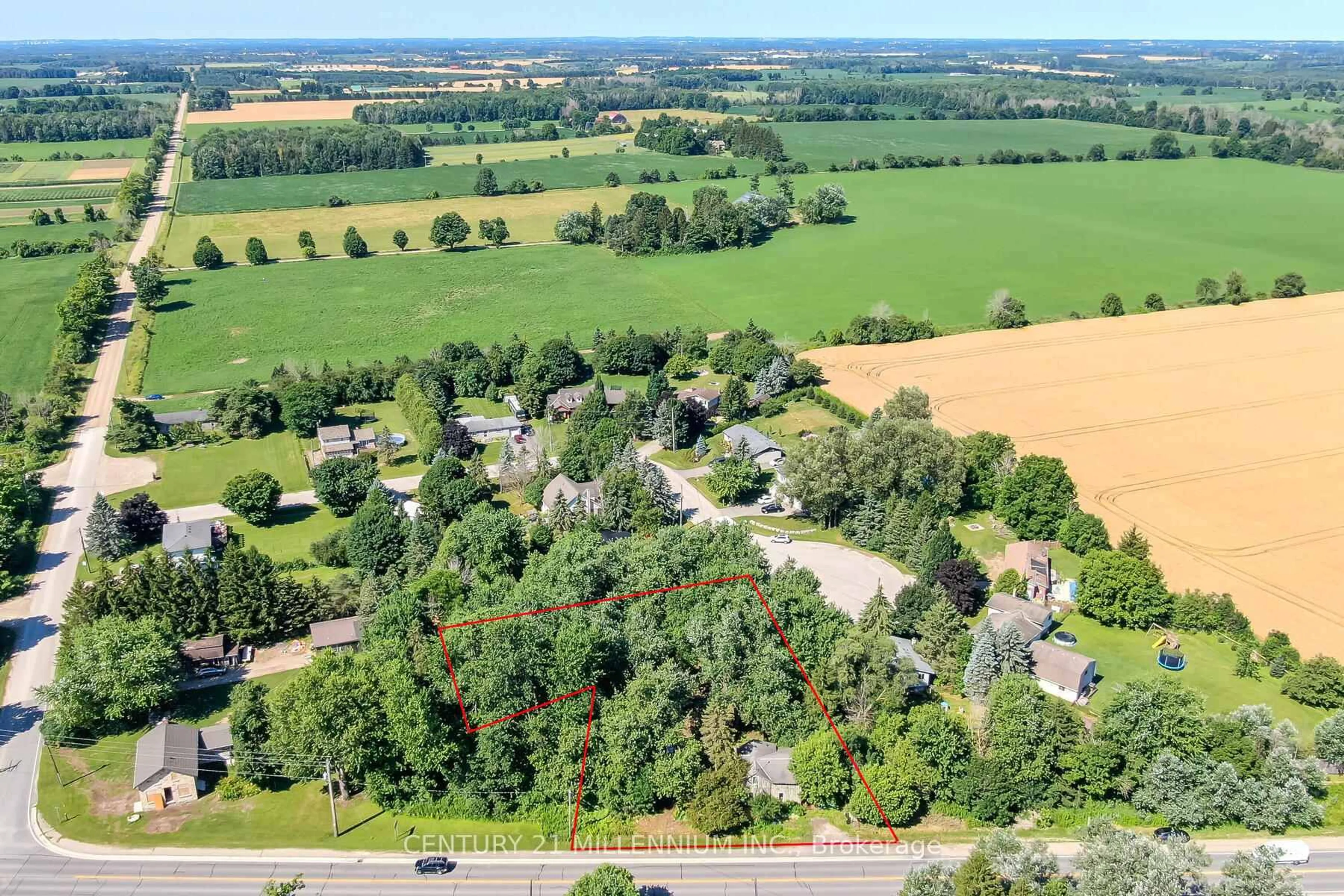 A pic from outside/outdoor area/front of a property/back of a property/a pic from drone, forest/trees view for 6052 Highway 6, Centre Wellington Ontario N0B 1S0