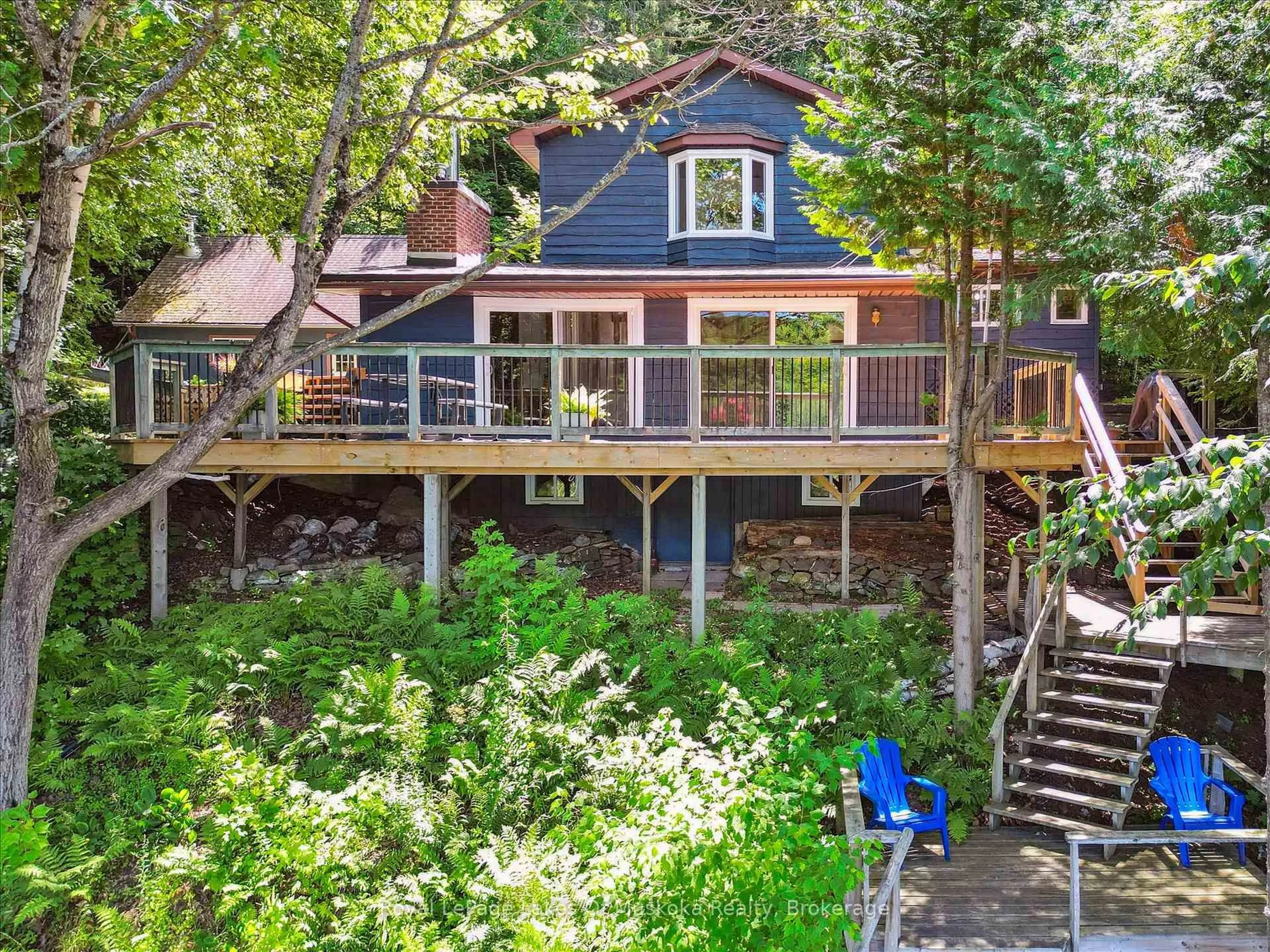 A pic from outside/outdoor area/front of a property/back of a property/a pic from drone, water/lake/river/ocean view for 1345 Sinclair Tr, Algonquin Highlands Ontario P0A 1E0