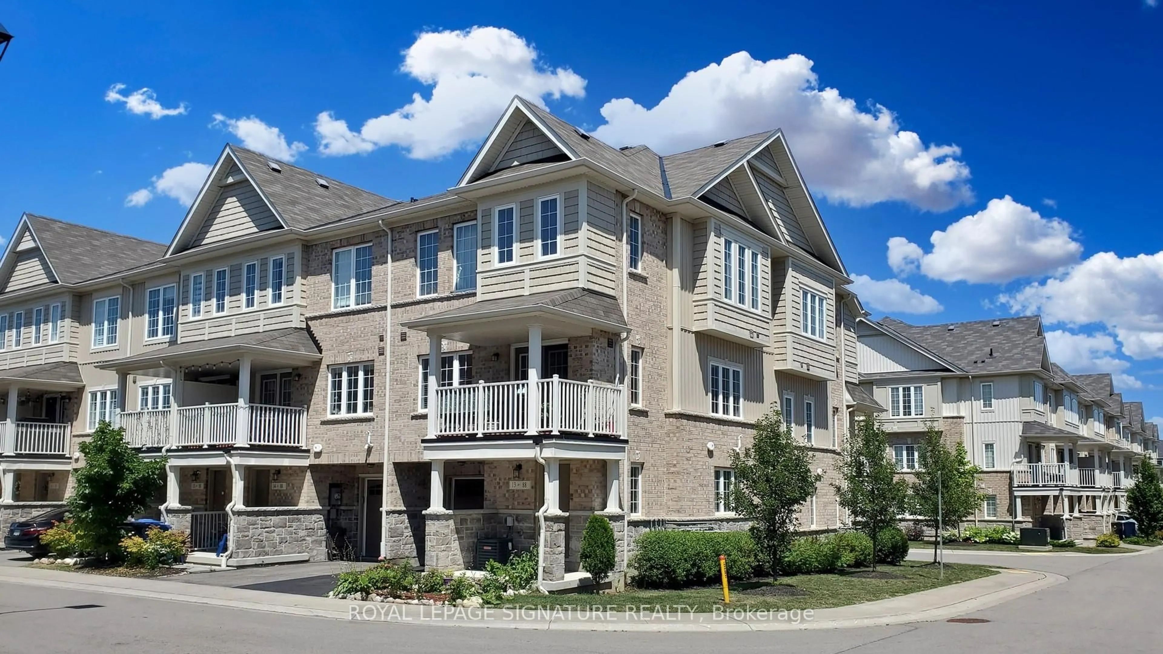 Home with vinyl exterior material, unknown for 88 Decorso Dr #13, Guelph Ontario N1L 0A1