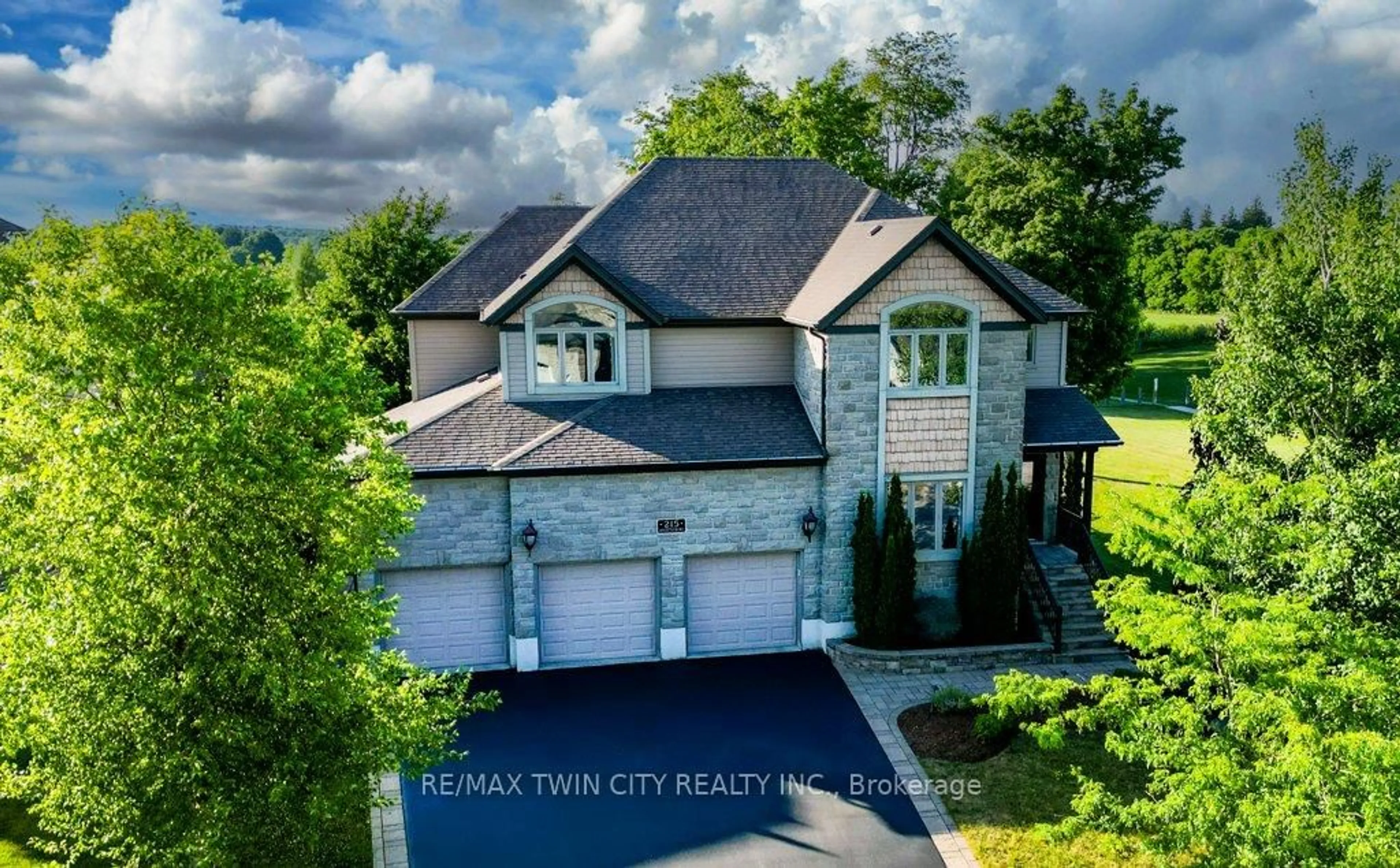 A pic from outside/outdoor area/front of a property/back of a property/a pic from drone, street for 215 Hostetler Rd, Wilmot Ontario N3A 0B1