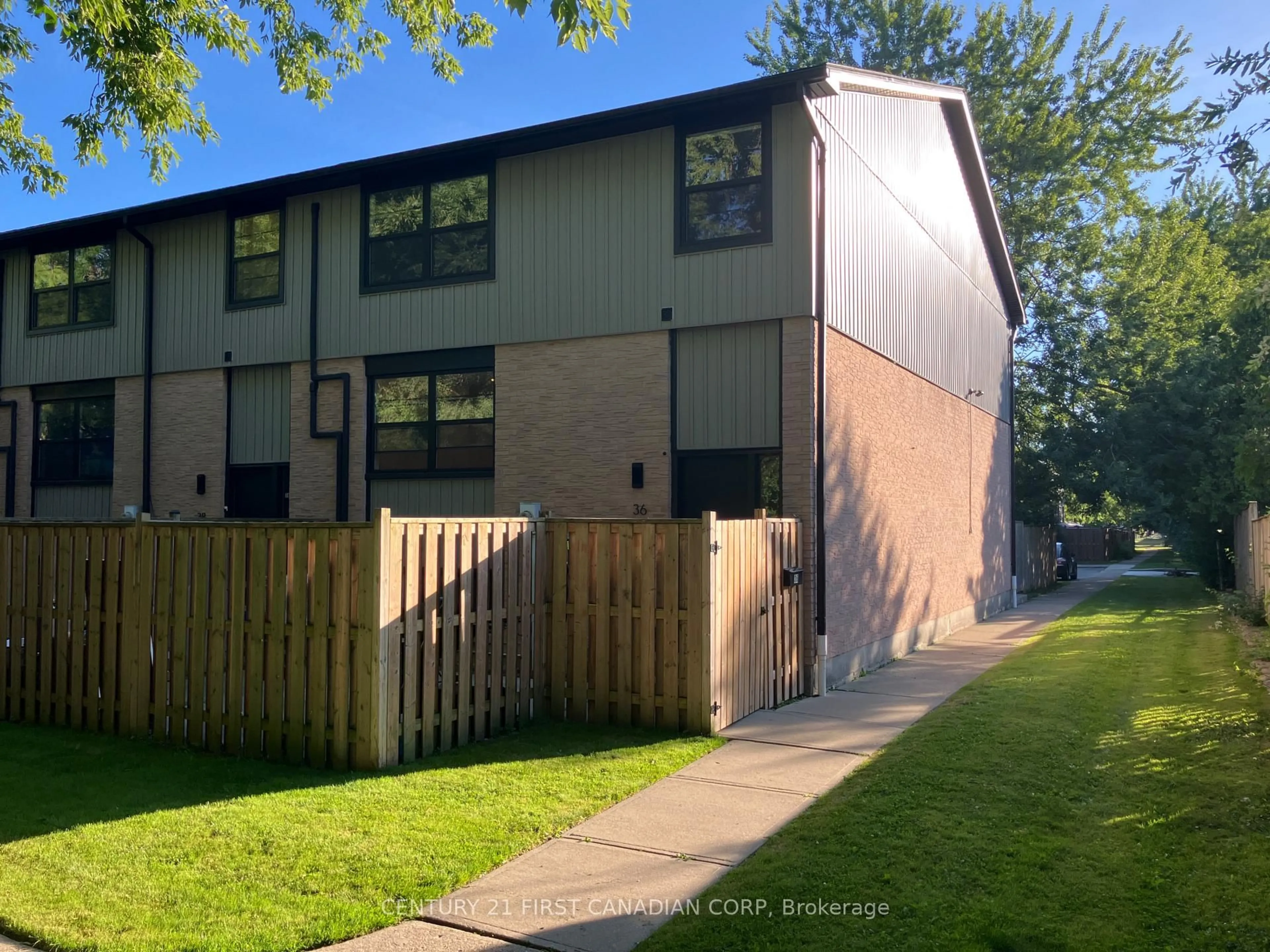 A pic from outside/outdoor area/front of a property/back of a property/a pic from drone, street for 105 Andover Dr #36, London South Ontario N6J 4B1