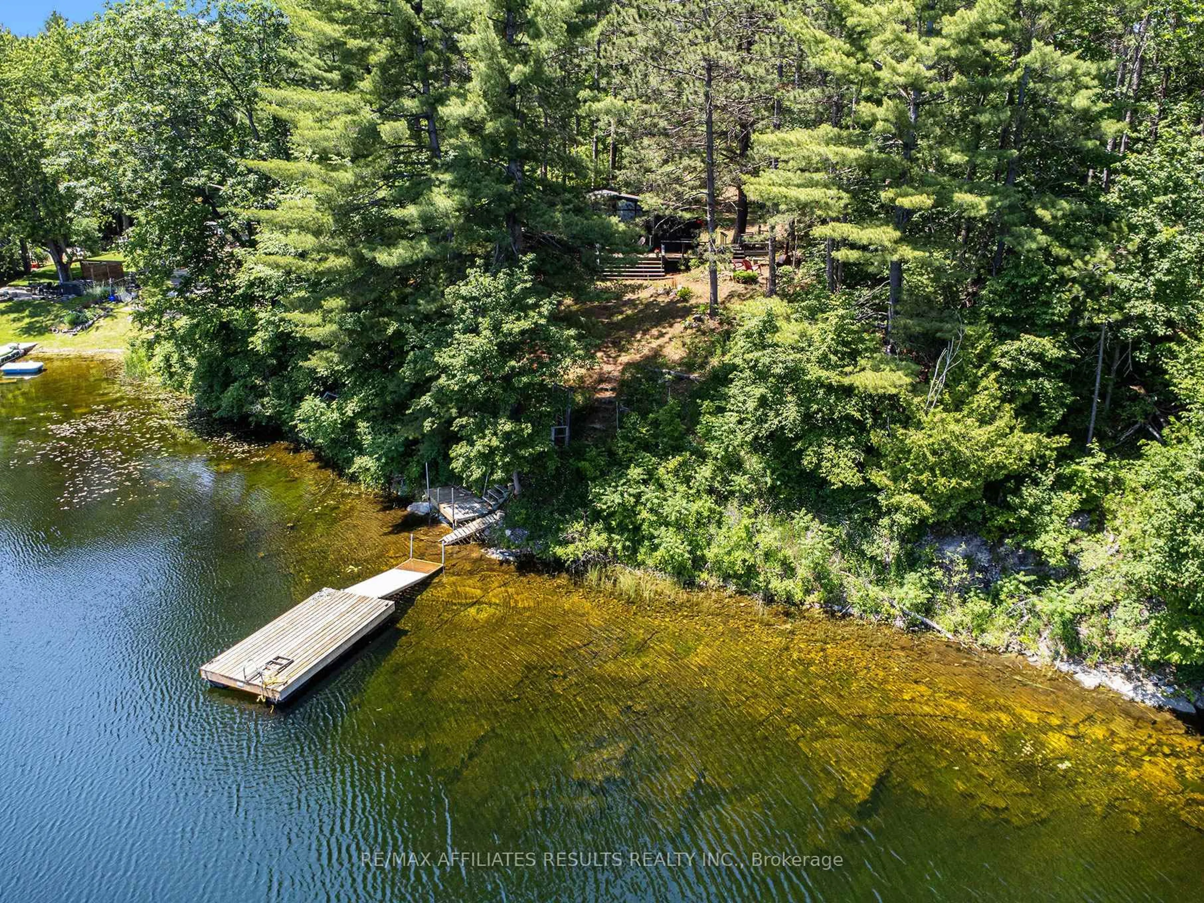 A pic from outside/outdoor area/front of a property/back of a property/a pic from drone, water/lake/river/ocean view for 1188 Black Lake N Shr Rd, Perth Ontario K7H 3C5