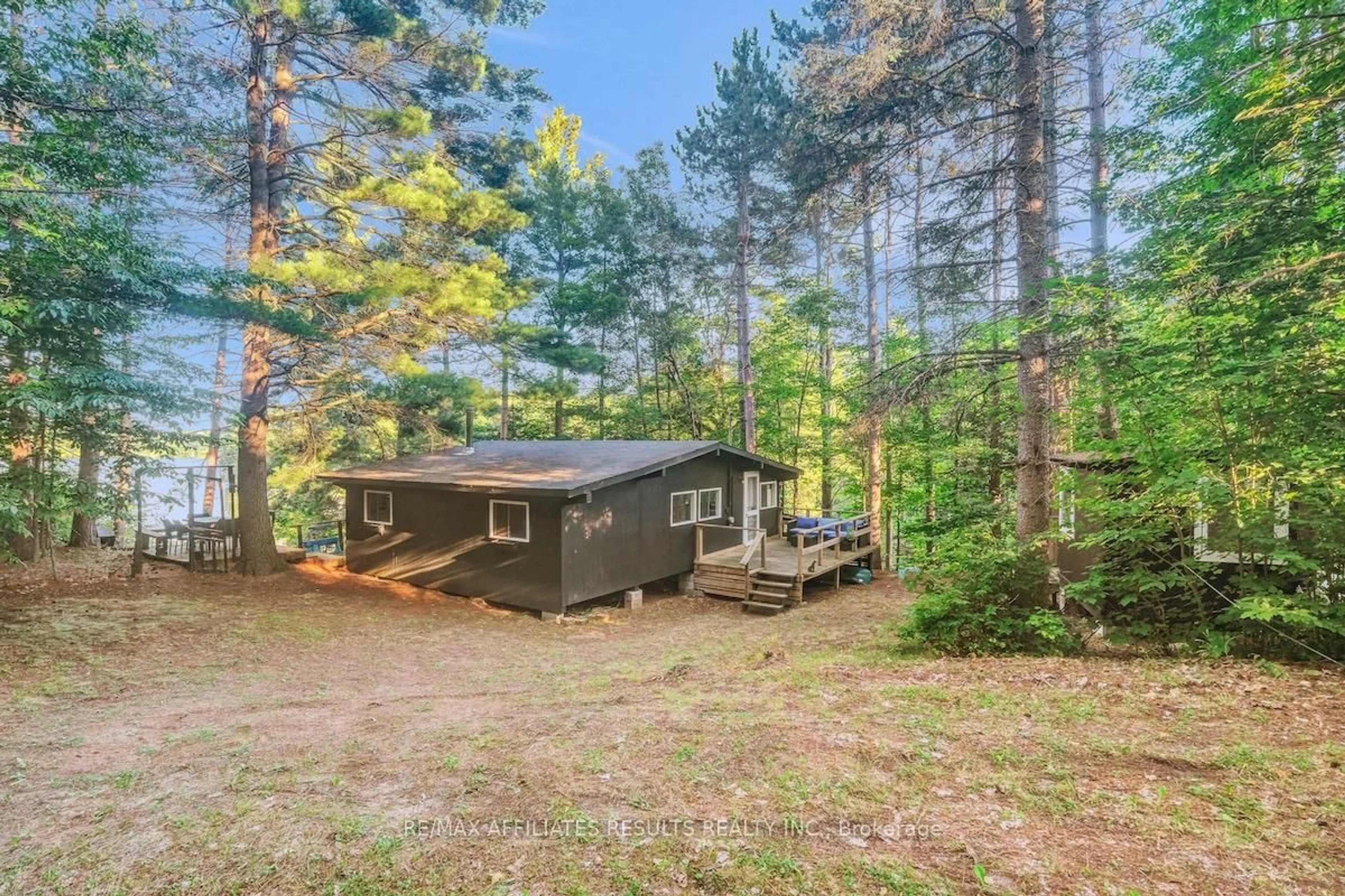 A pic from outside/outdoor area/front of a property/back of a property/a pic from drone, forest/trees view for 1188 Black Lake N Shr Rd, Perth Ontario K7H 3C5