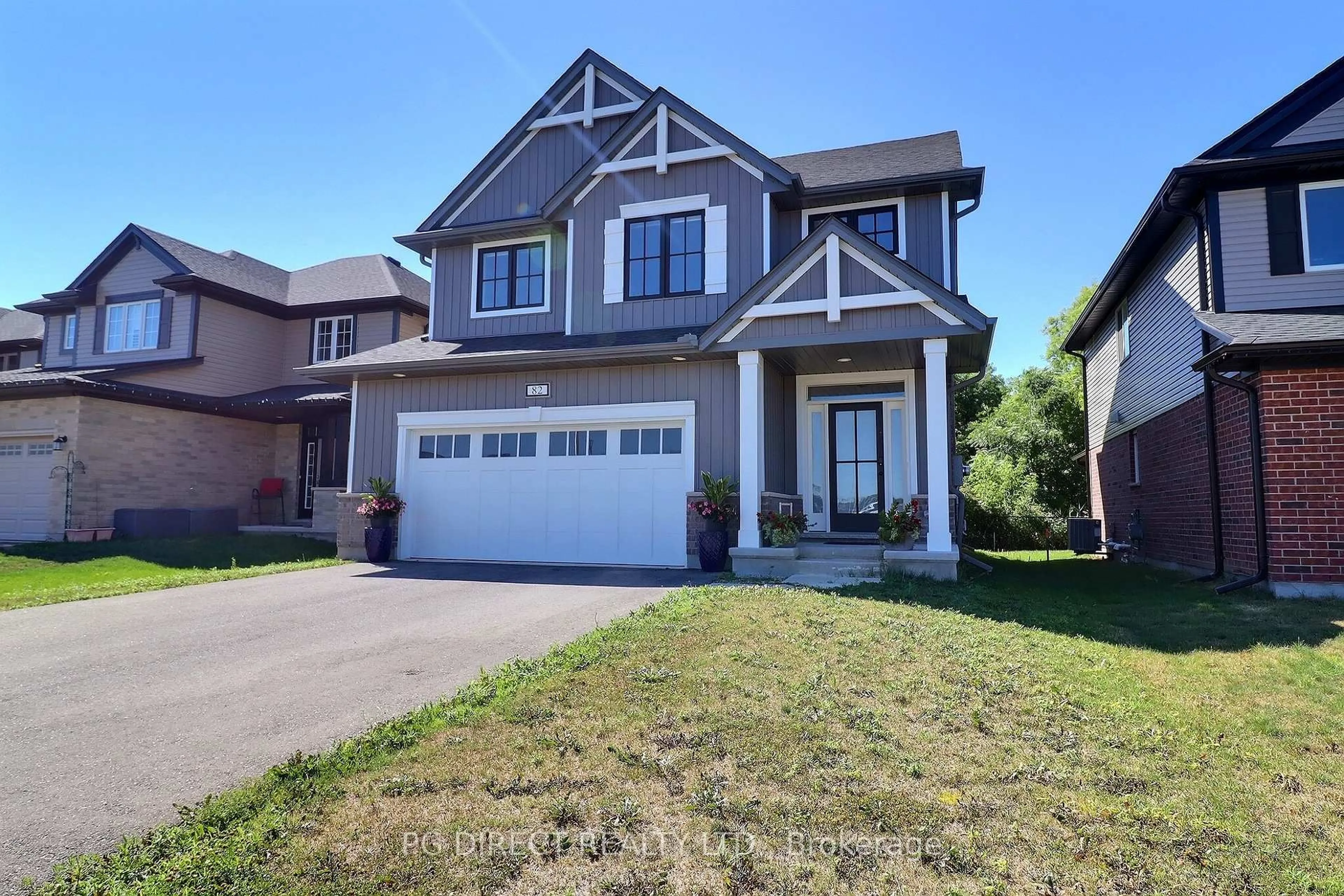 Home with vinyl exterior material, street for 82 Livingston Dr, Tillsonburg Ontario N4J 0J3