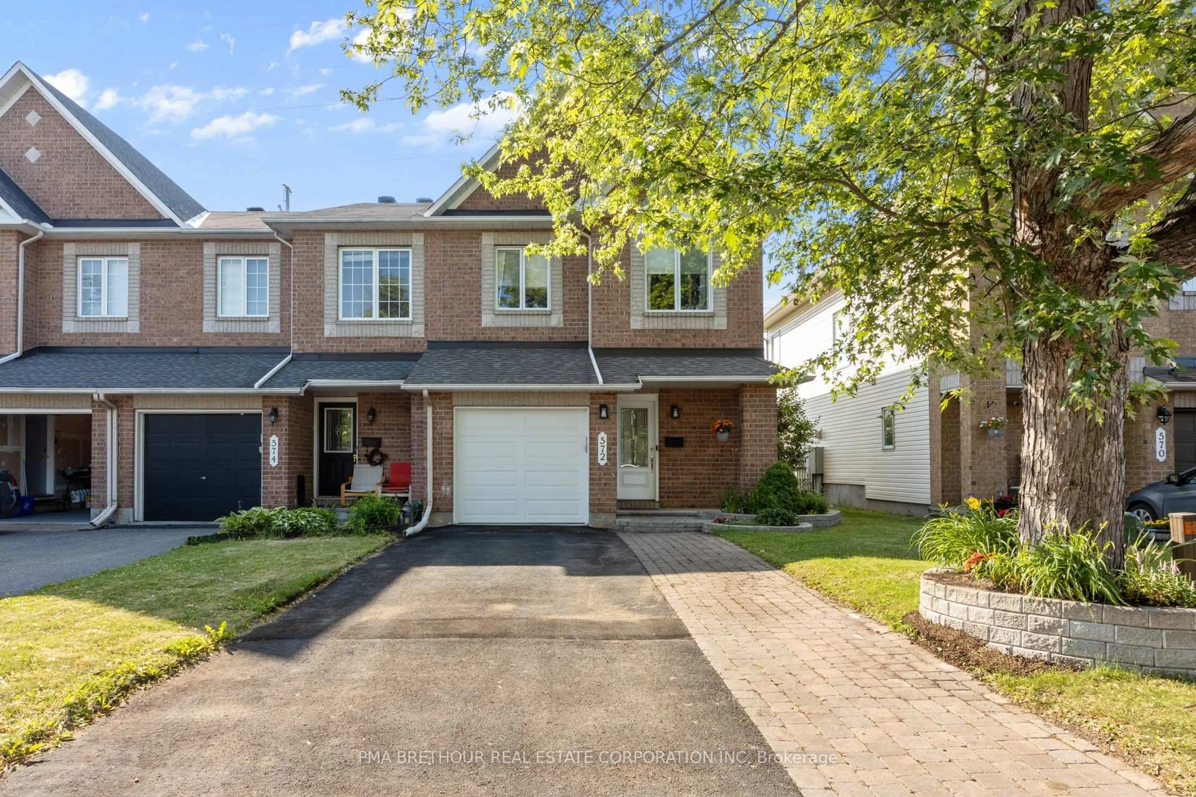 Home with brick exterior material, street for 572 Renaissance Dr, Ottawa Ontario K4A 4E9