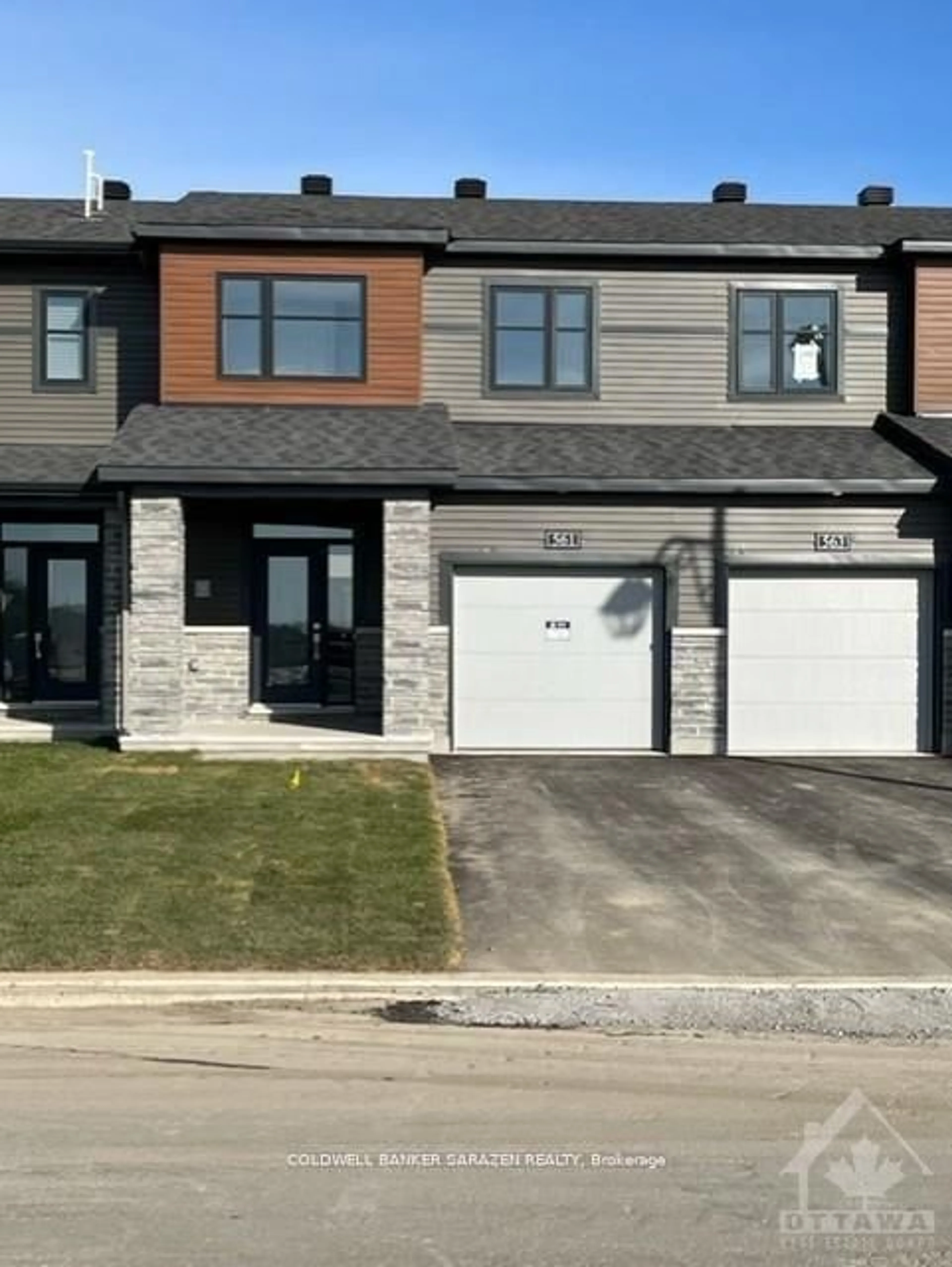 Home with brick exterior material, street for 561 Aglish Mews, Ottawa Ontario K2J 6Y2