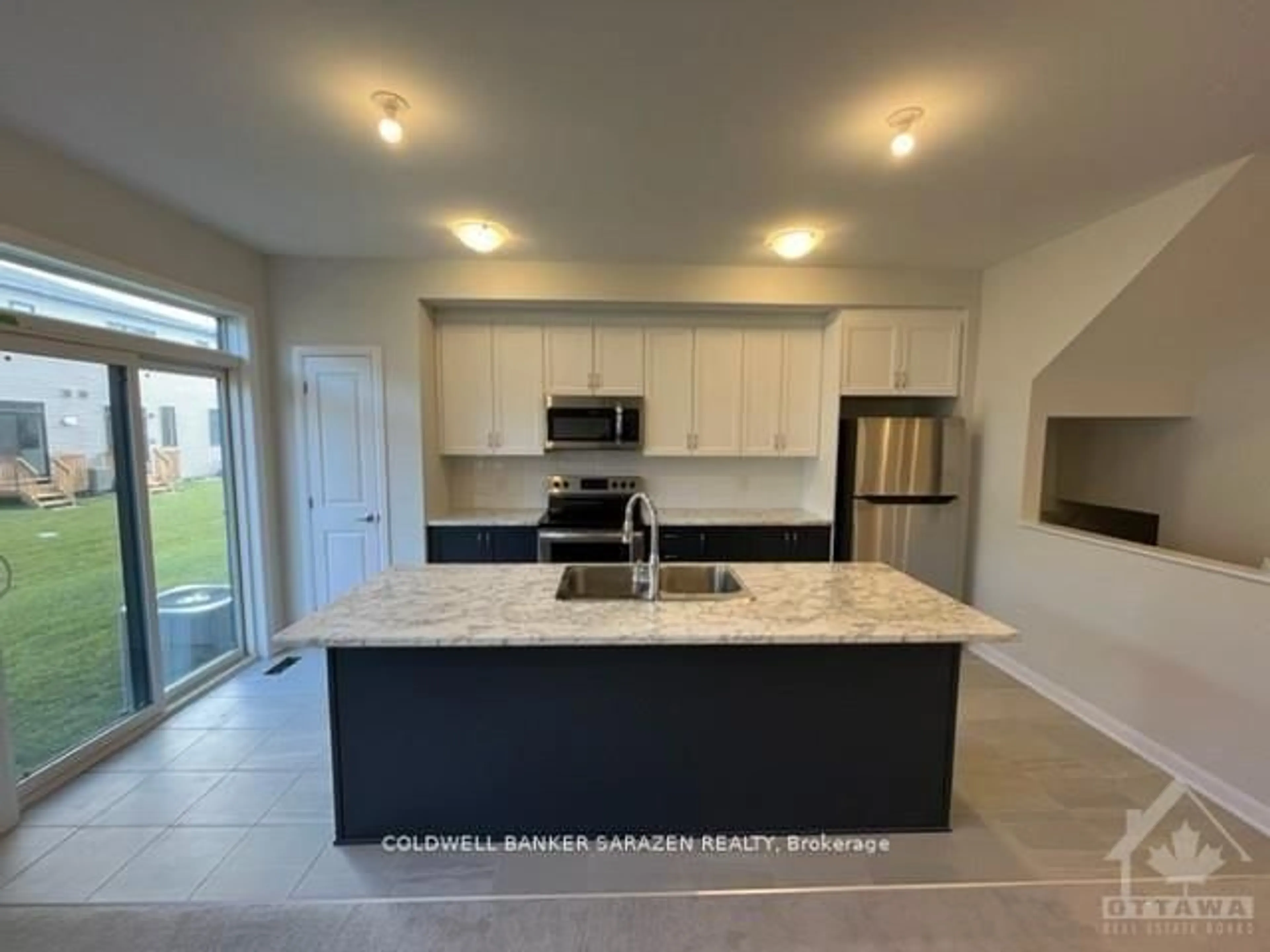 Open concept kitchen, ceramic/tile floor for 561 Aglish Mews, Ottawa Ontario K2J 6Y2