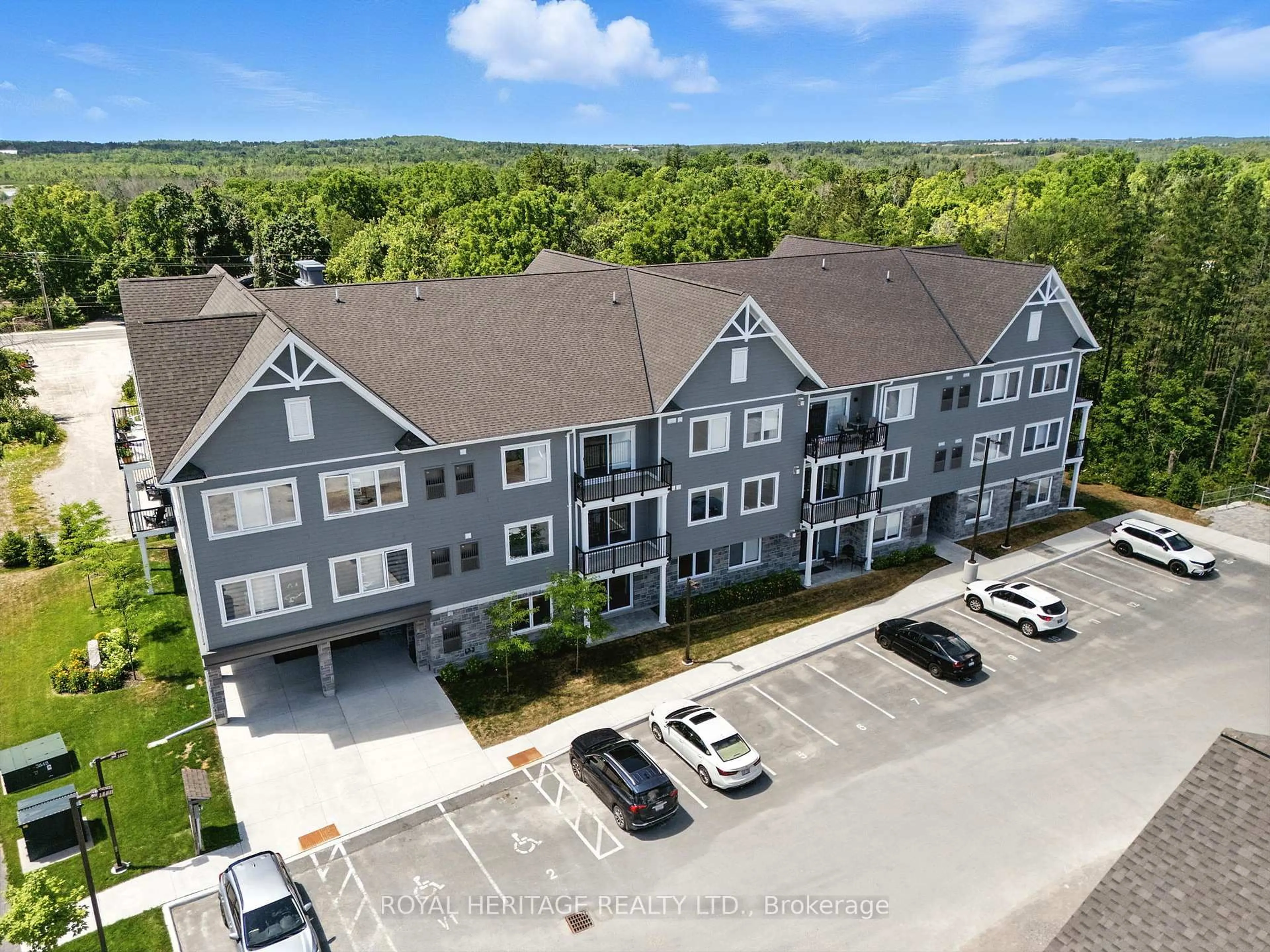 A pic from outside/outdoor area/front of a property/back of a property/a pic from drone, unknown for 19 Hampton Lane #103, Selwyn Ontario K0L 2H0