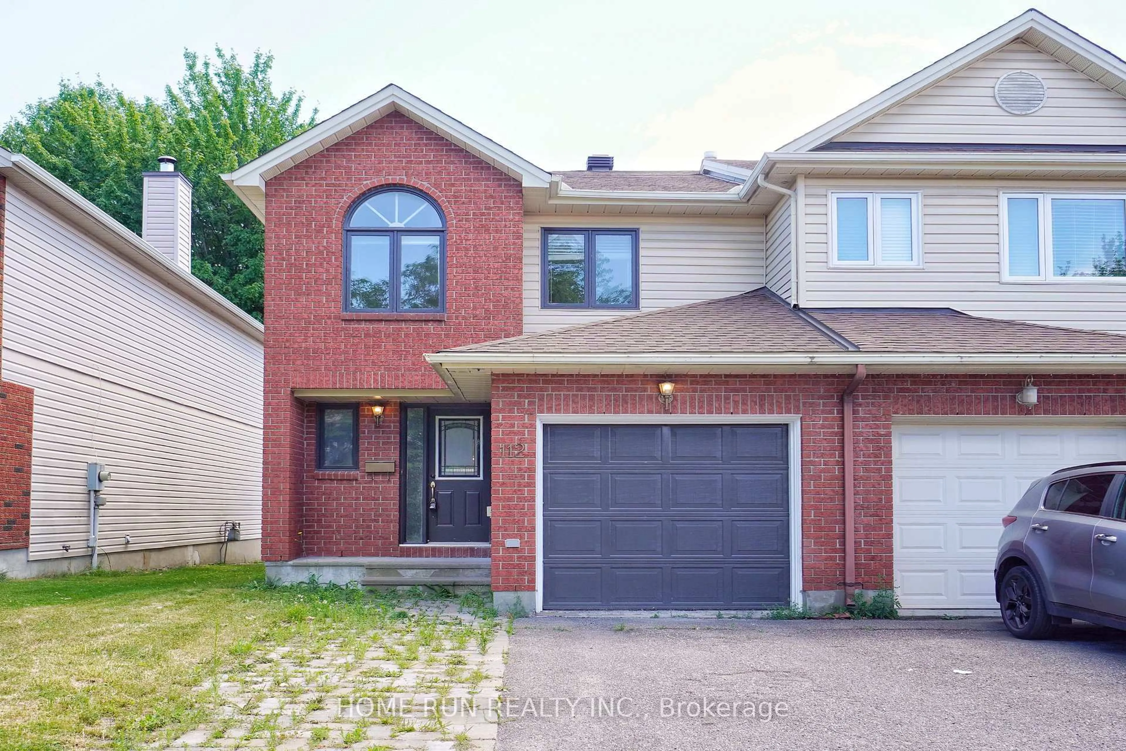 Home with brick exterior material, street for 112 Cedarock Dr, Ottawa Ontario K2M 2H5