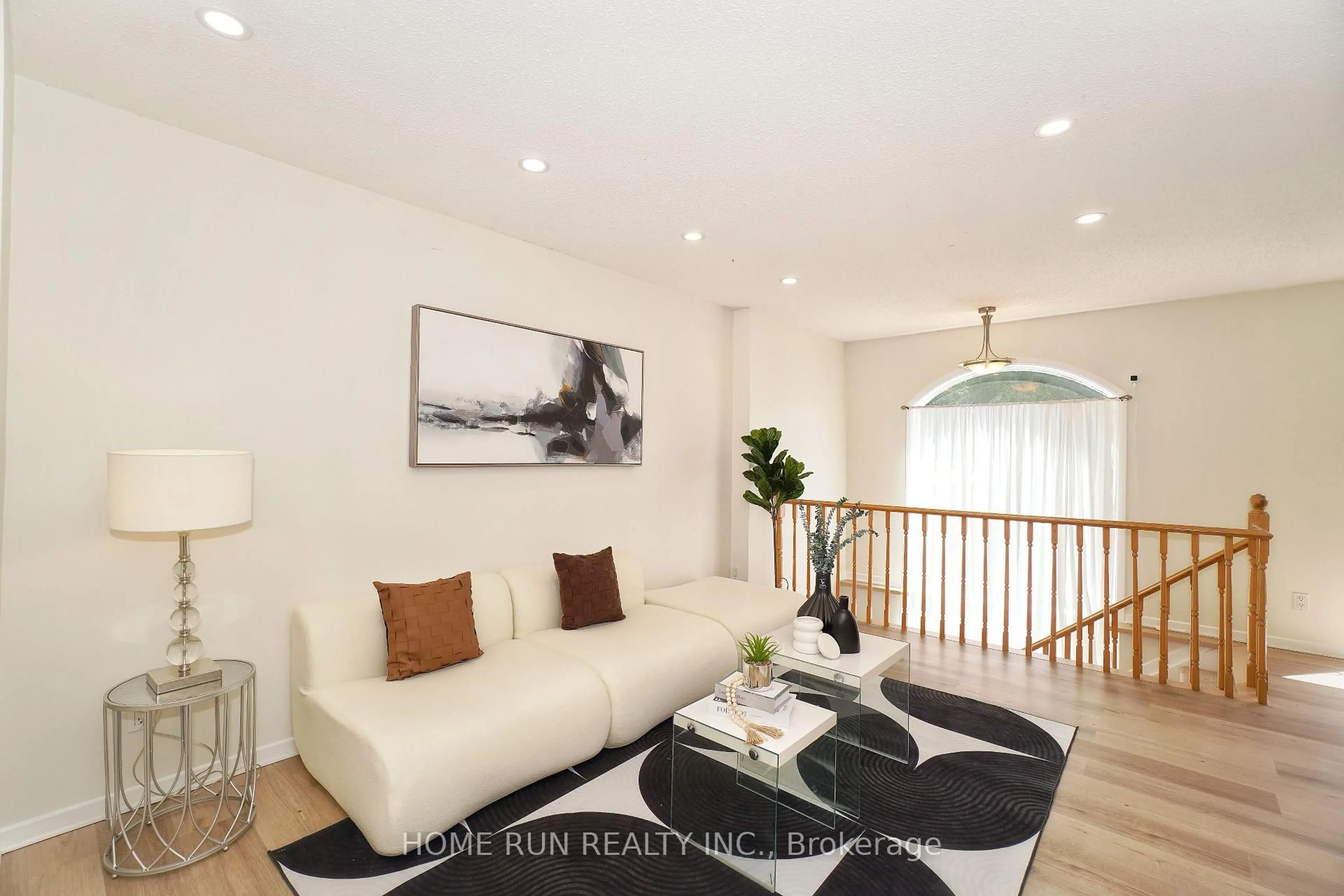 Living room with furniture, wood/laminate floor for 112 Cedarock Dr, Ottawa Ontario K2M 2H5