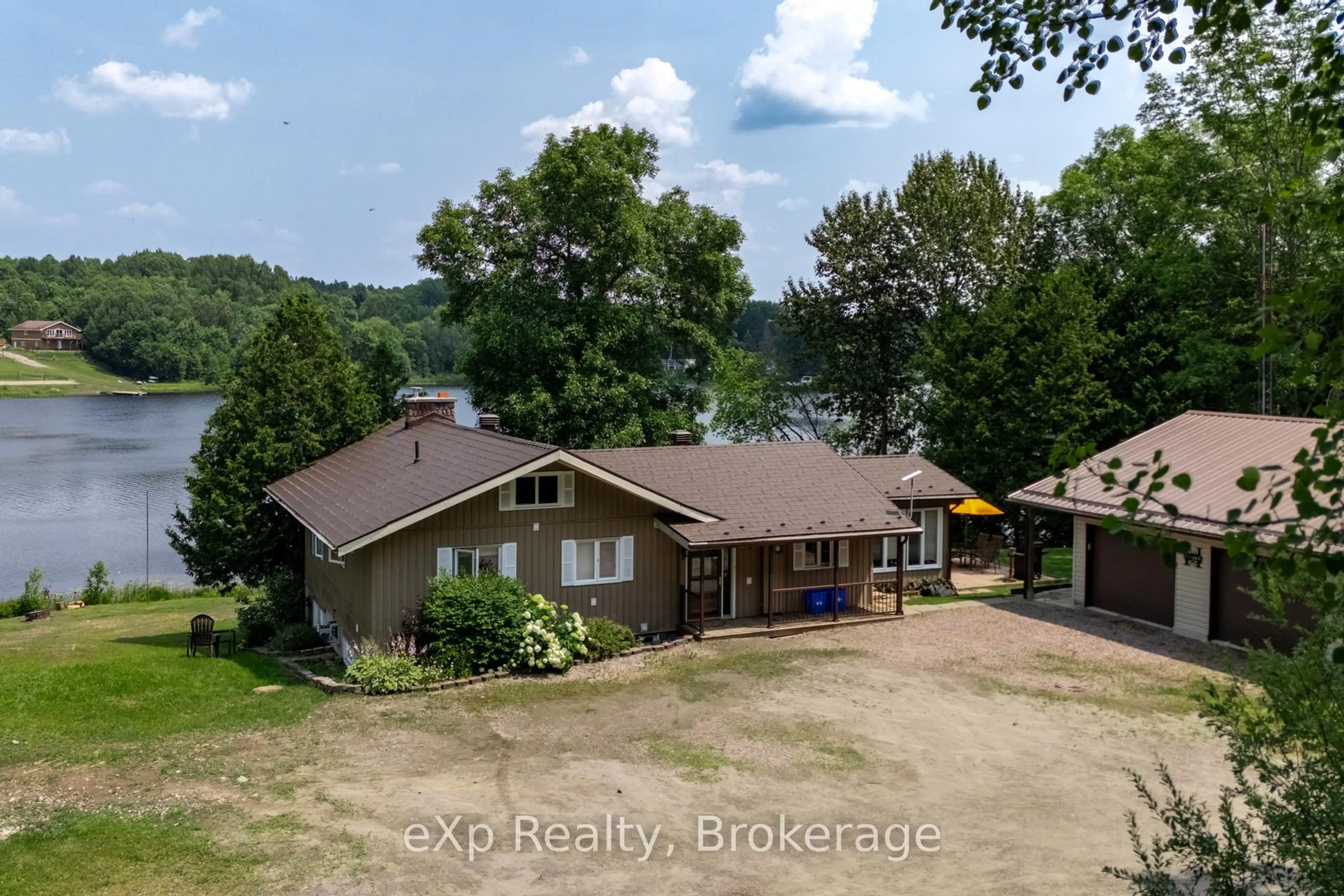 A pic from outside/outdoor area/front of a property/back of a property/a pic from drone, water/lake/river/ocean view for 688A Prevost Rd, French River Ontario P0M 2N0