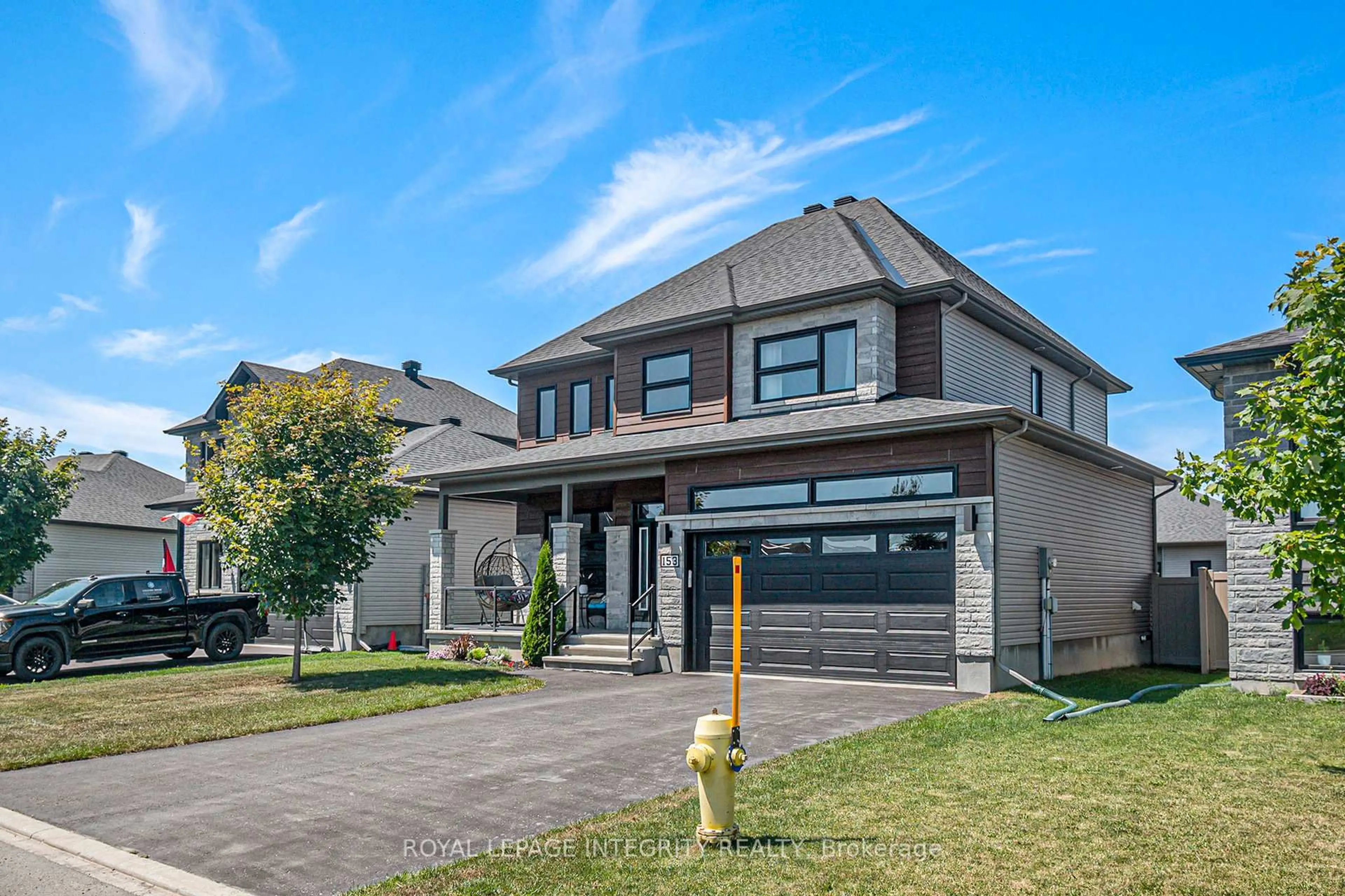 Home with brick exterior material, street for 153 Lyon St, Russell Ontario K0A 1W0