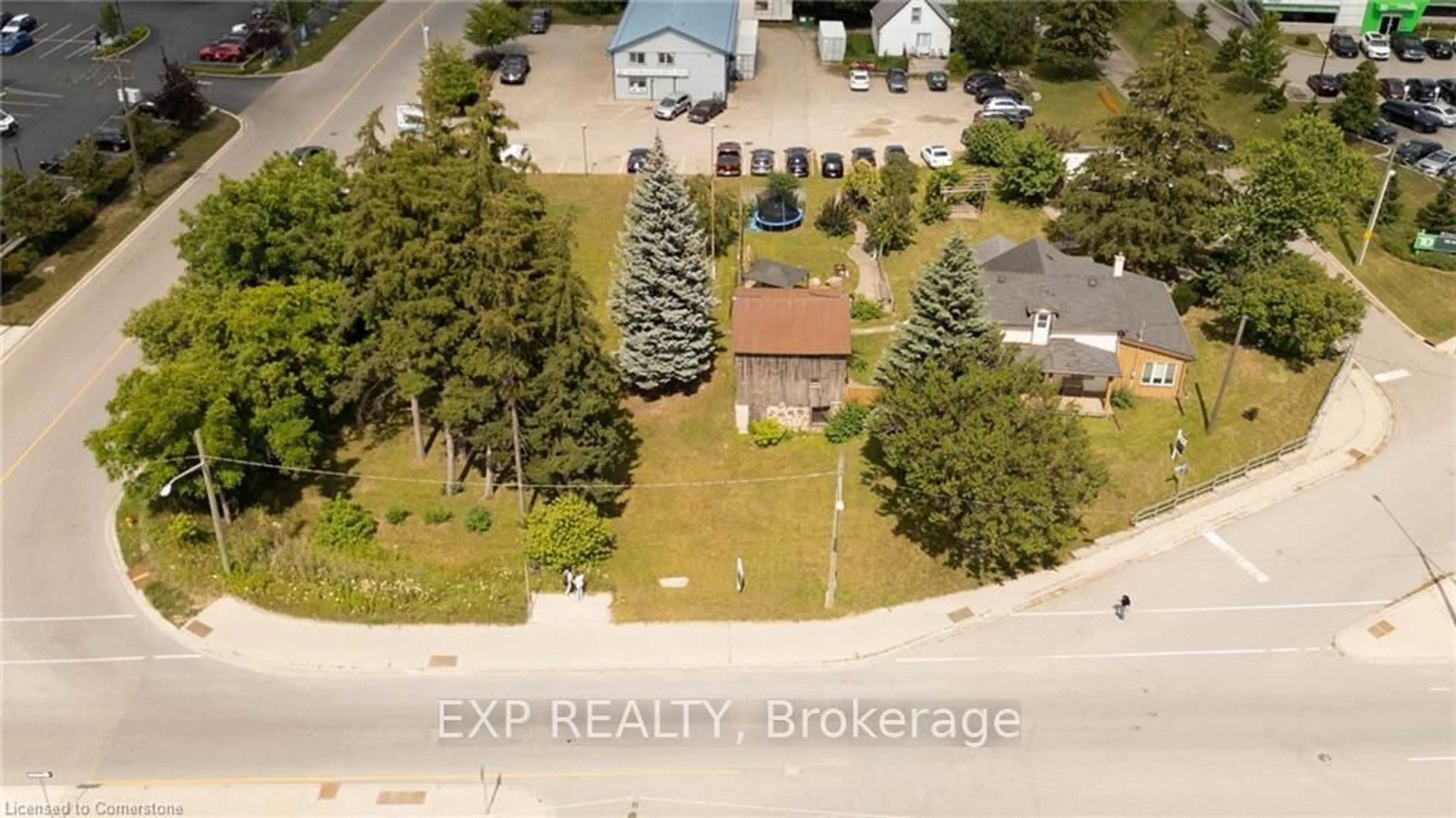 A pic from outside/outdoor area/front of a property/back of a property/a pic from drone, street for 28 Manitou Dr, Kitchener Ontario N2C 2K7