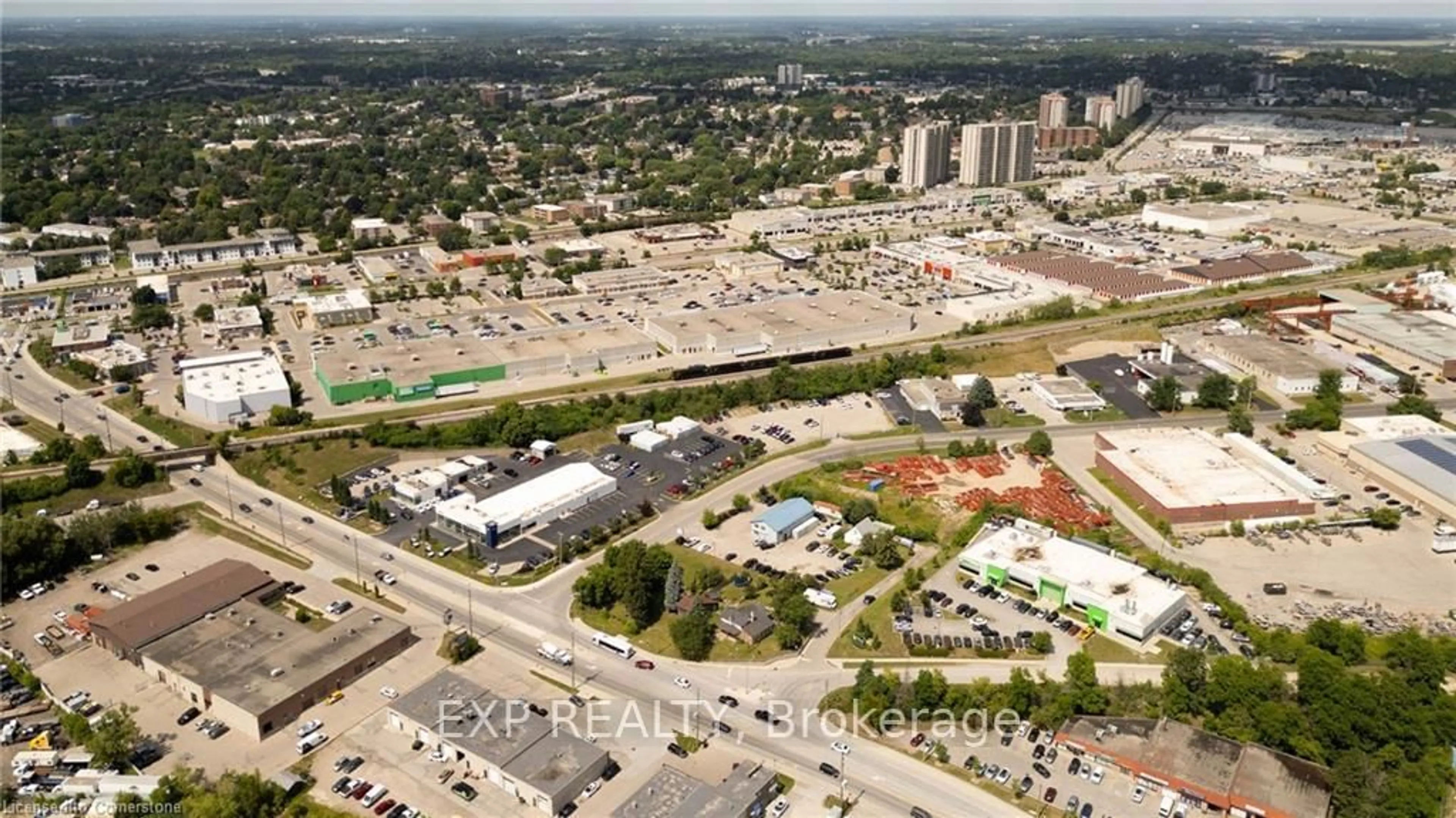 A pic from outside/outdoor area/front of a property/back of a property/a pic from drone, street for 28 Manitou Dr, Kitchener Ontario N2C 2K7