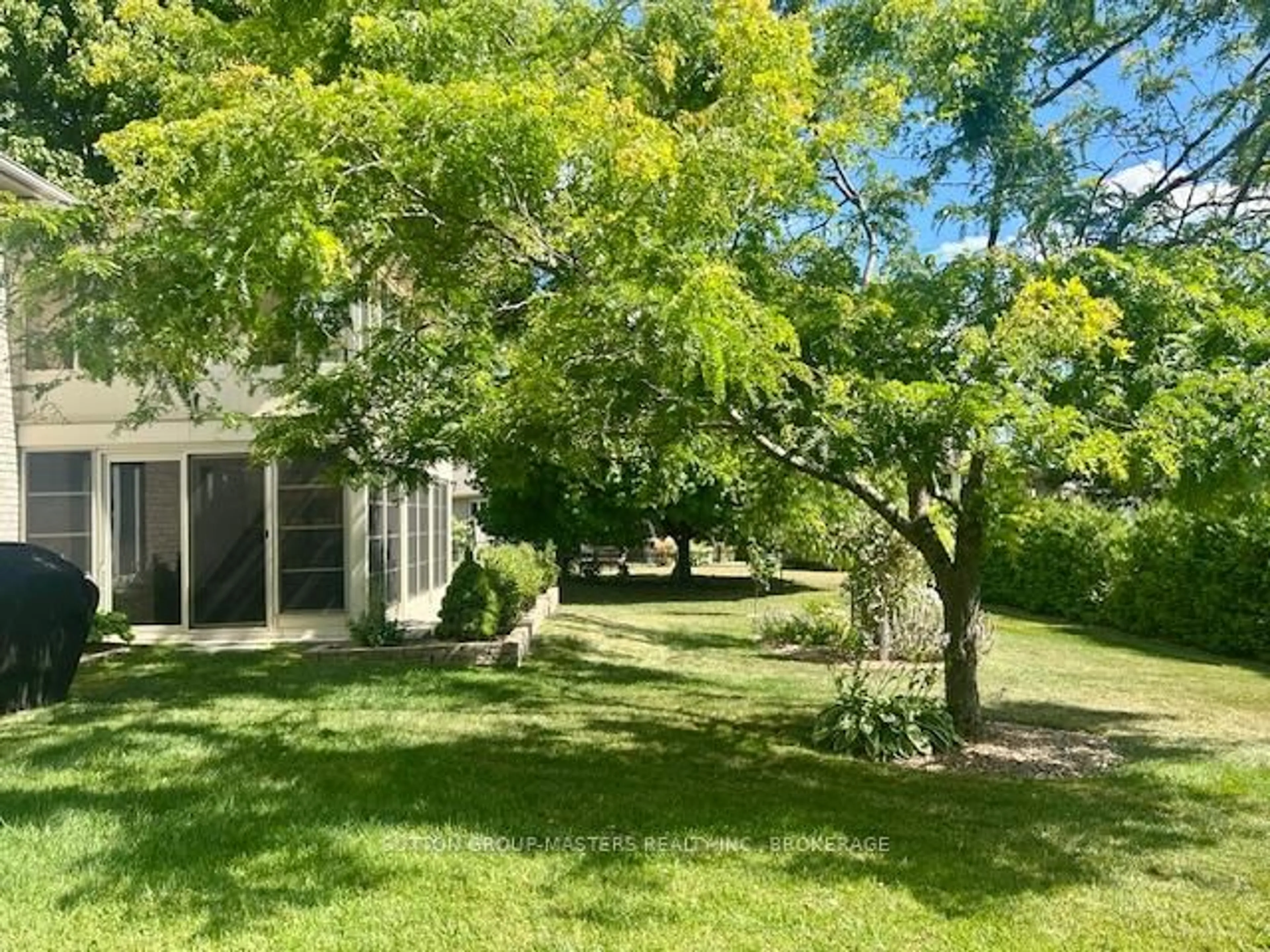 A pic from outside/outdoor area/front of a property/back of a property/a pic from drone, forest/trees view for 132 Farmstead Crt, Kingston Ontario K7P 3H9