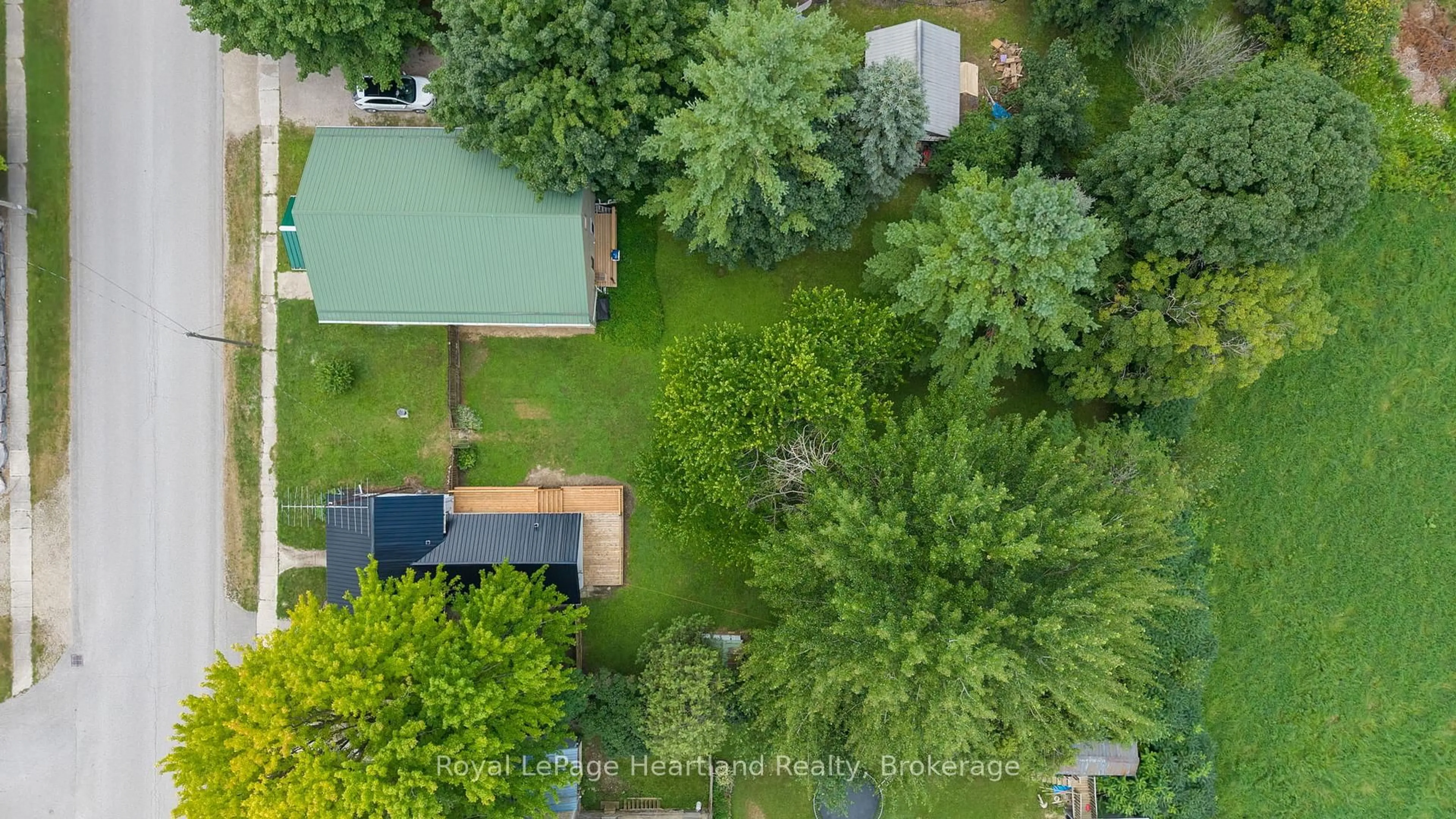 A pic from outside/outdoor area/front of a property/back of a property/a pic from drone, forest/trees view for 12 Brandon St, Morris Turnberry Ontario N0G 1E0