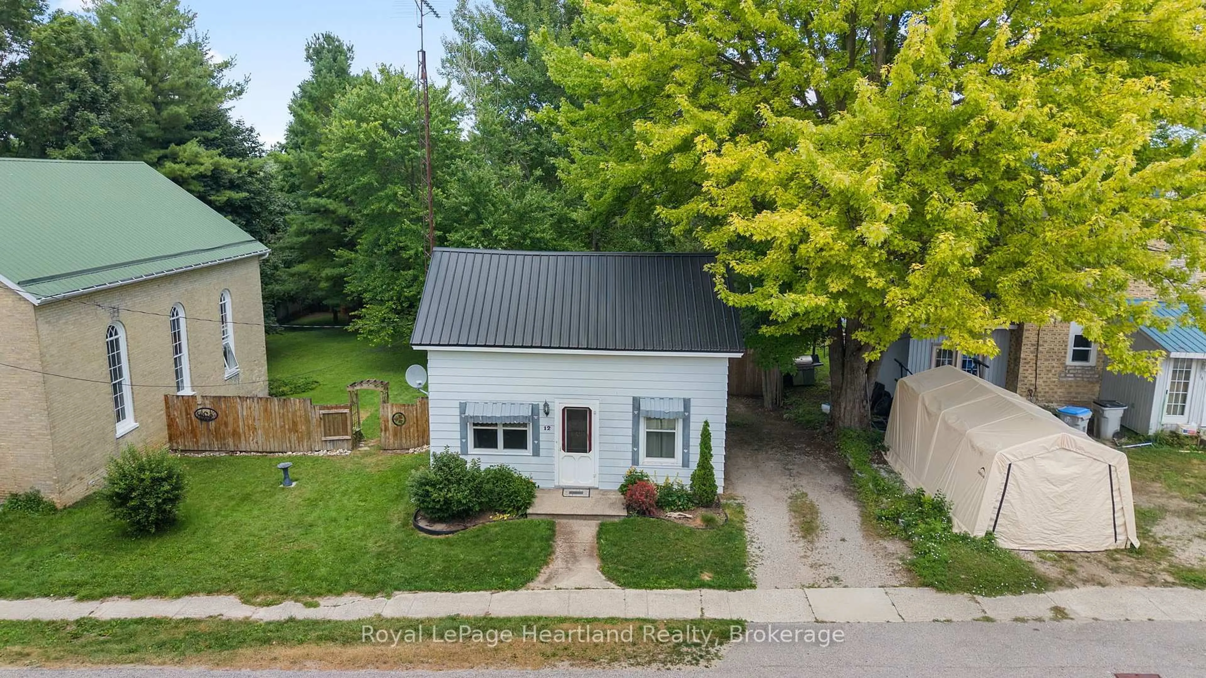 A pic from outside/outdoor area/front of a property/back of a property/a pic from drone, street for 12 Brandon St, Morris Turnberry Ontario N0G 1E0