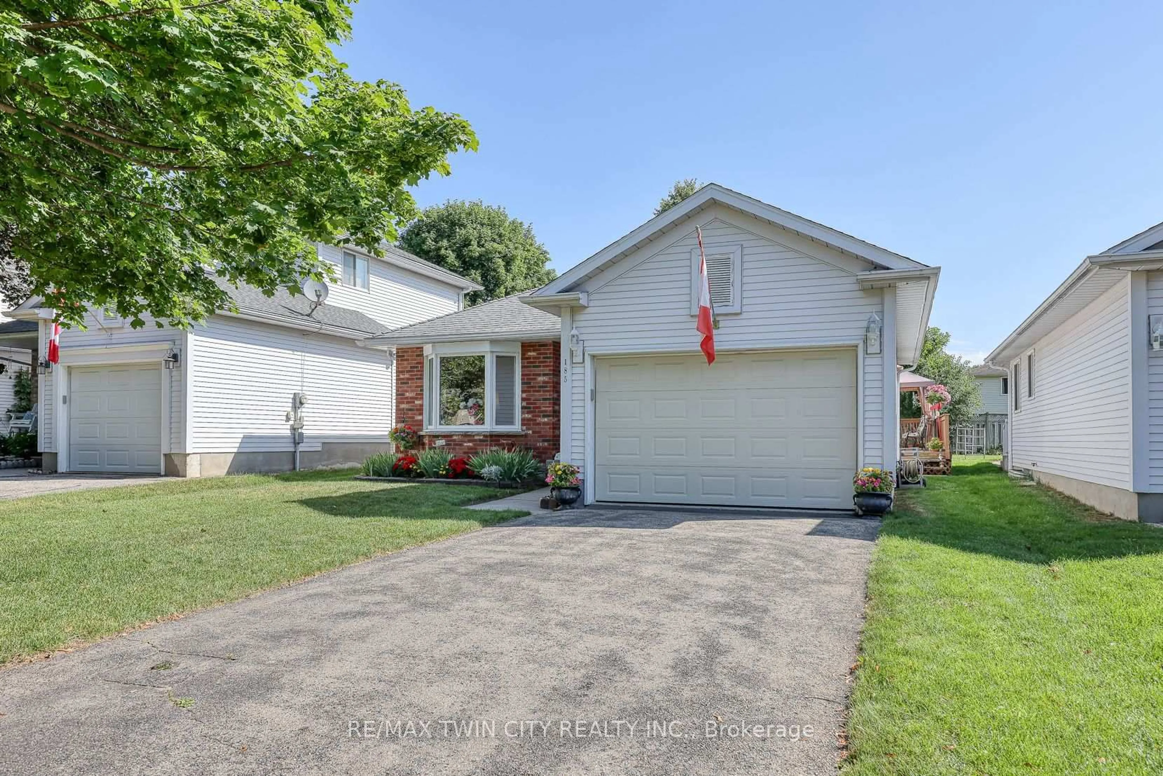 Home with vinyl exterior material, street for 185 Dartmoor Cres, Waterloo Ontario N2K 3S8