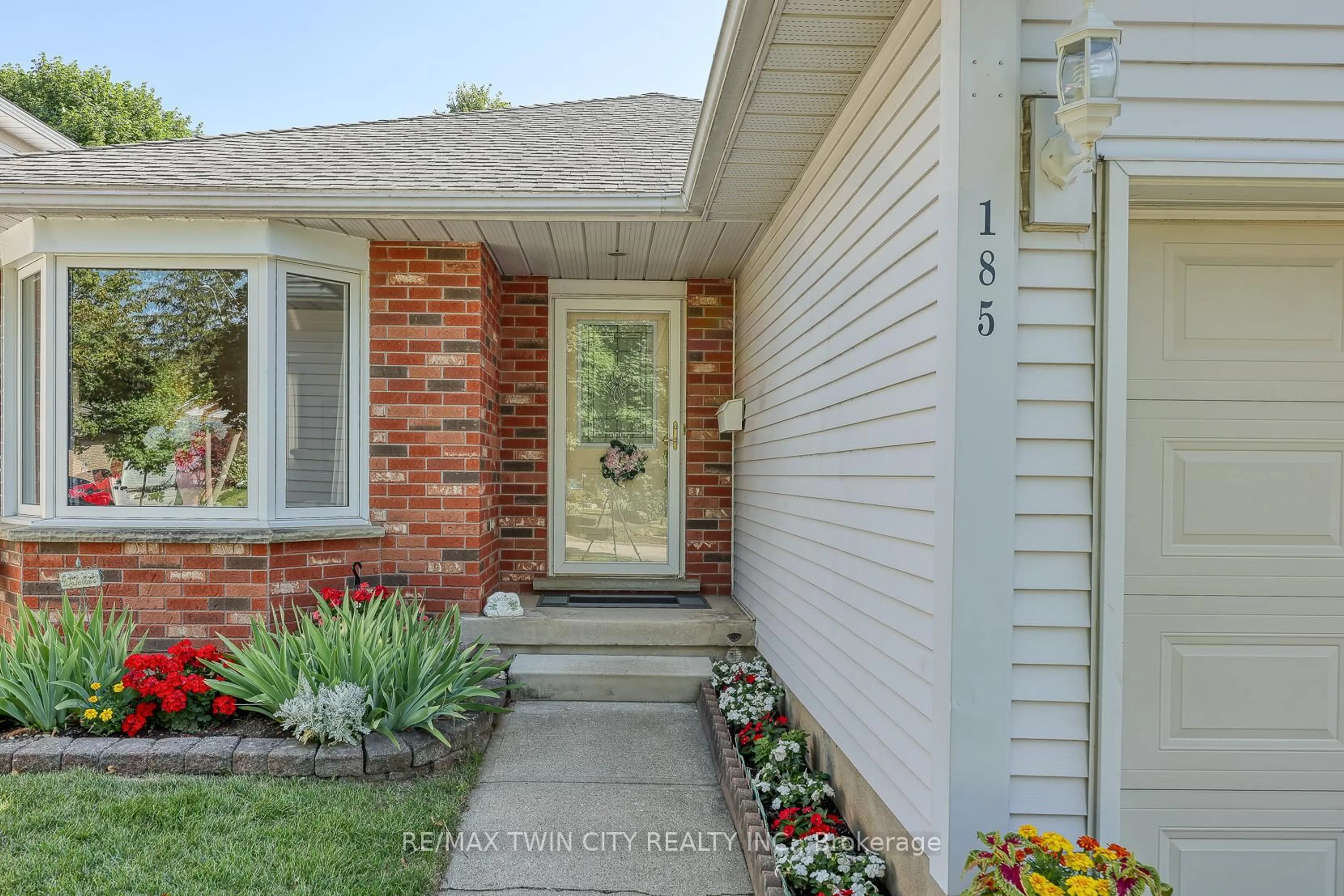 Home with brick exterior material, street for 185 Dartmoor Cres, Waterloo Ontario N2K 3S8