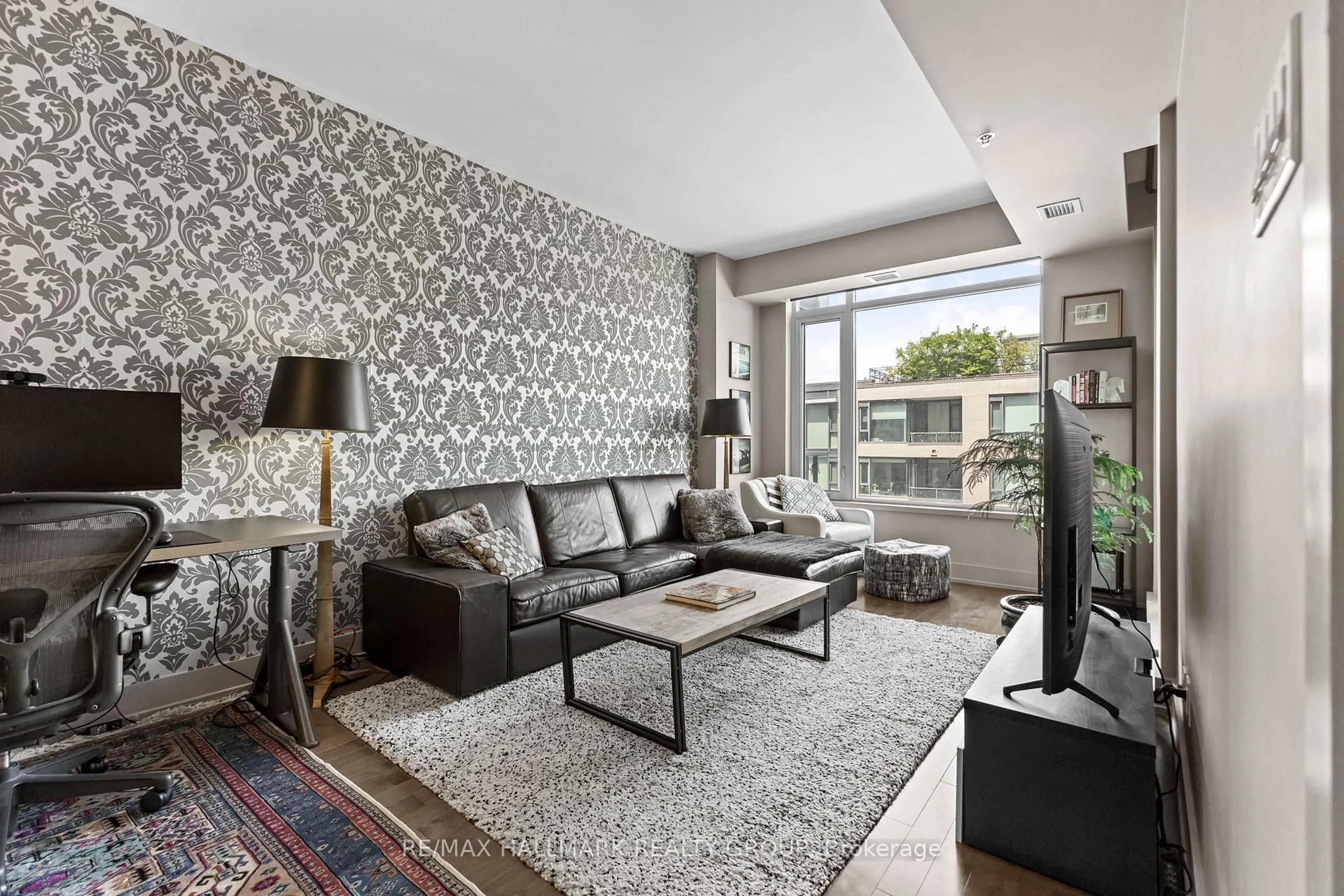 Living room with furniture, unknown for 108 Richmond Rd #507, Ottawa Ontario K1Z 6V9