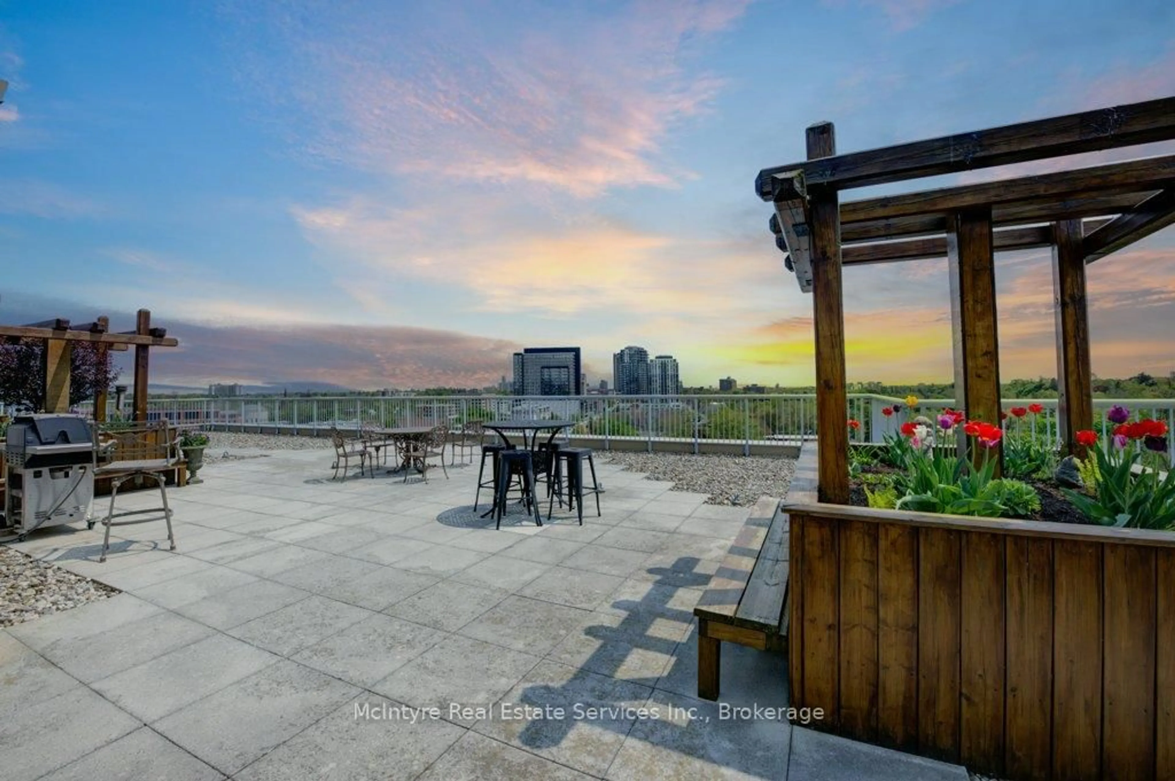 Patio, city buildings view from balcony for 5 Father David Bauer Dr #105, Waterloo Ontario N2L 6M2