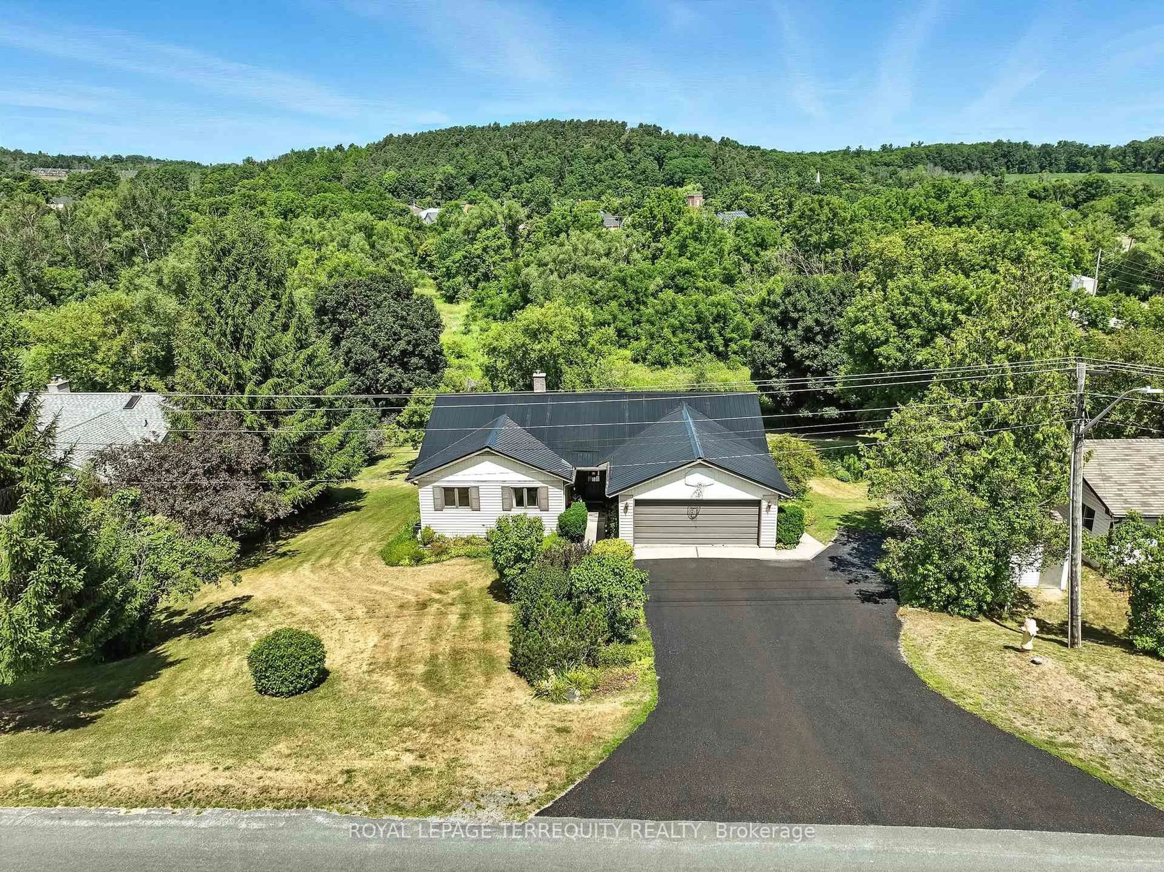 A pic from outside/outdoor area/front of a property/back of a property/a pic from drone, mountain view for 9 Concession St, Trent Hills Ontario K0K 3K0