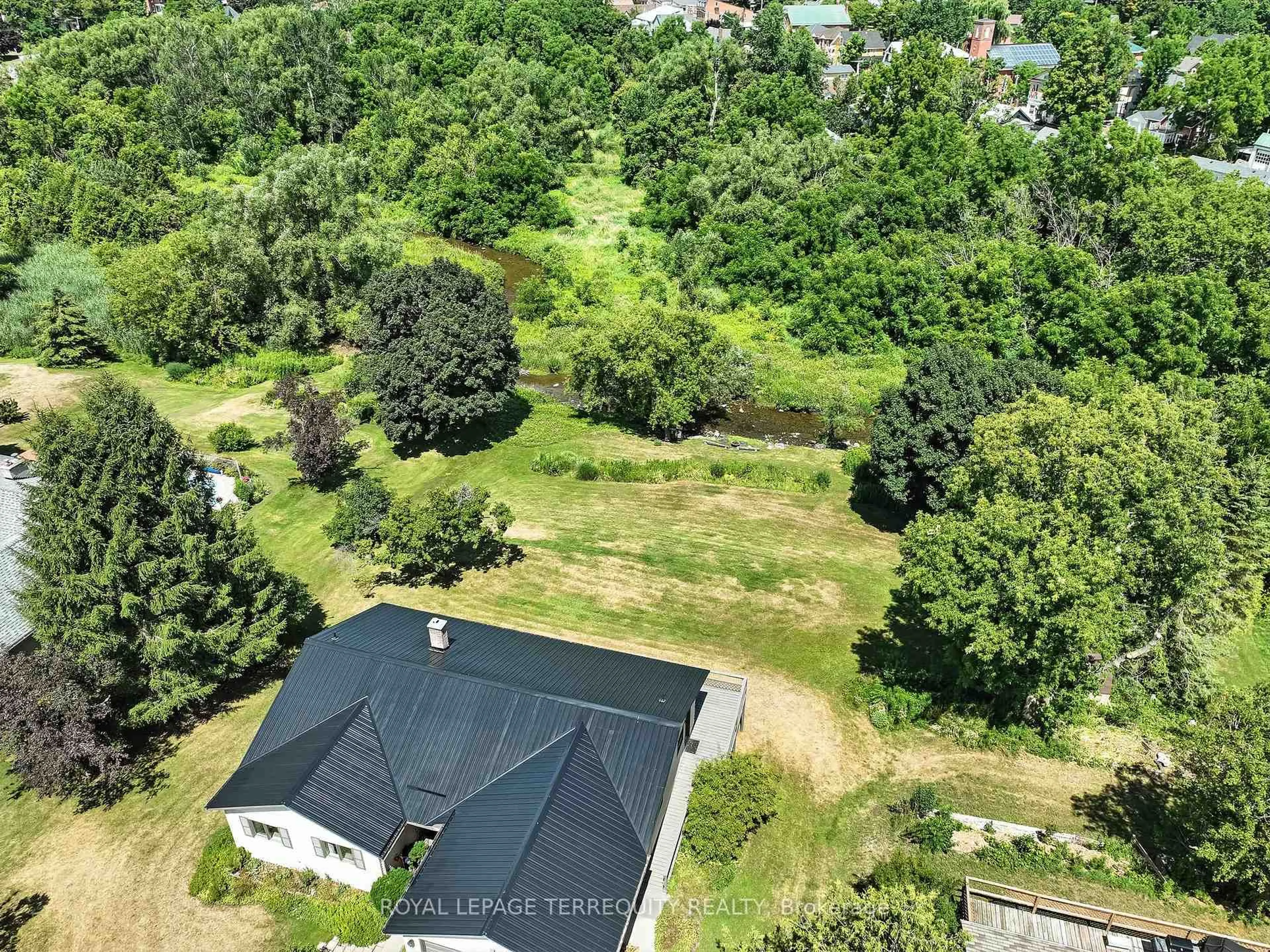 A pic from outside/outdoor area/front of a property/back of a property/a pic from drone, forest/trees view for 9 Concession St, Trent Hills Ontario K0K 3K0