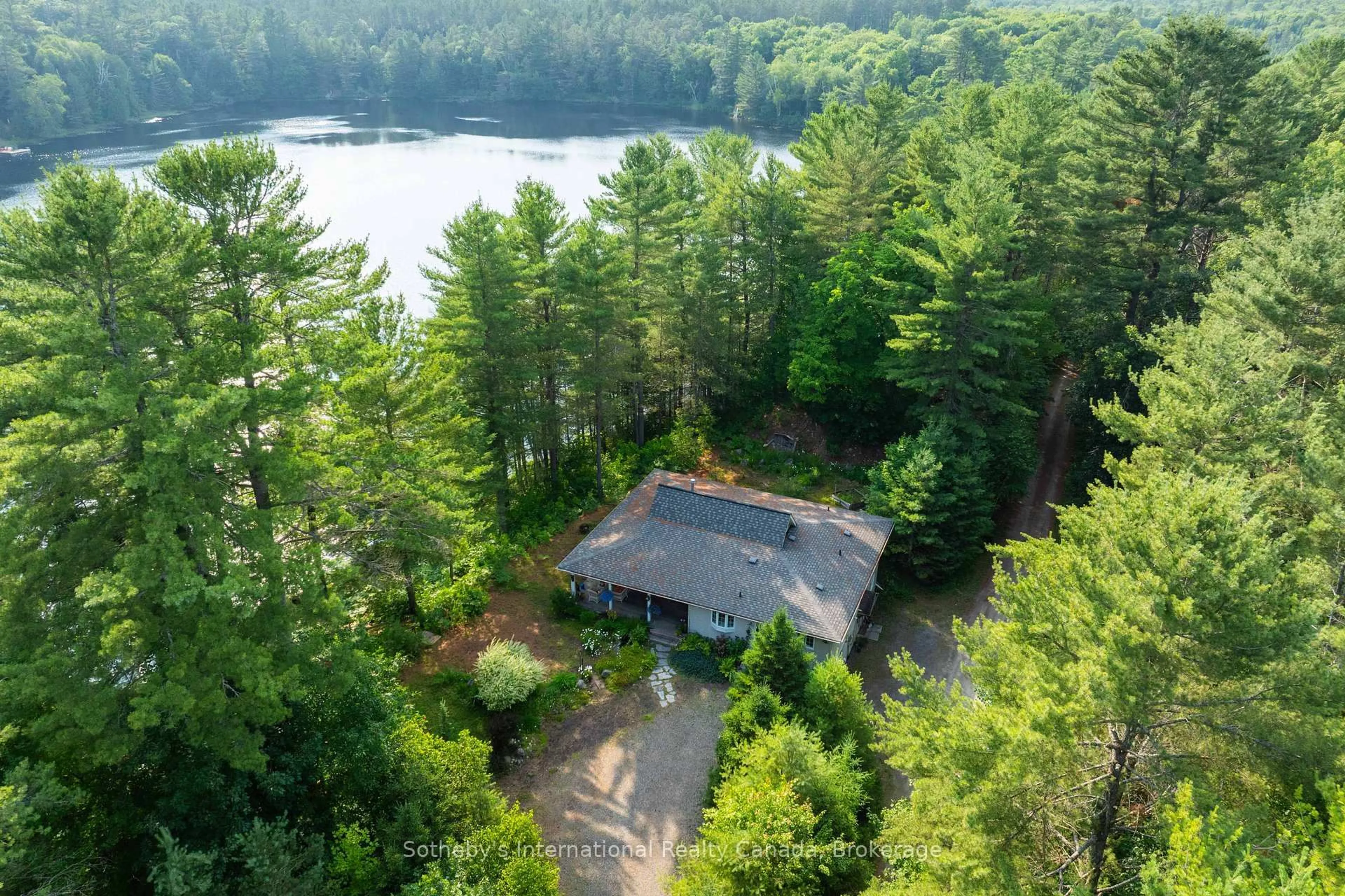 A pic from outside/outdoor area/front of a property/back of a property/a pic from drone, water/lake/river/ocean view for 176 Ripple & Palette Lake Rd, Huntsville Ontario P1H 2J4