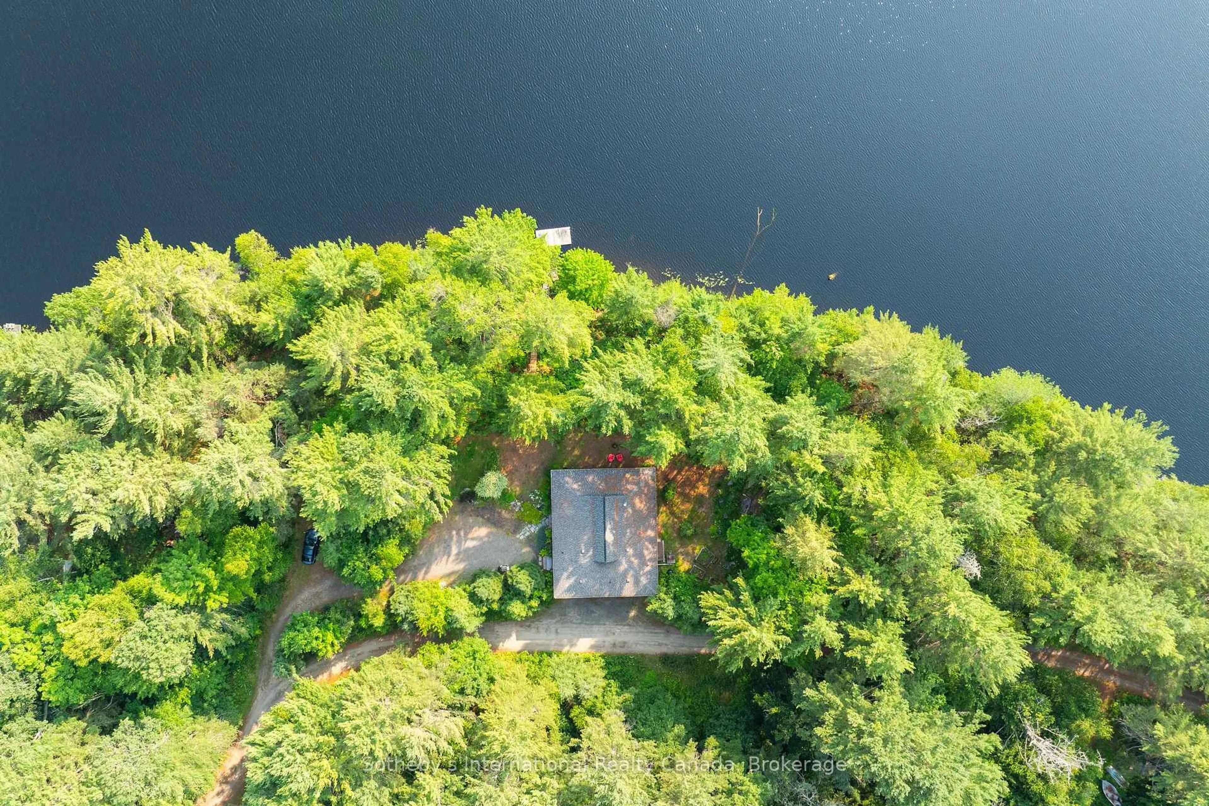 A pic from outside/outdoor area/front of a property/back of a property/a pic from drone, water/lake/river/ocean view for 176 Ripple & Palette Lake Rd, Huntsville Ontario P1H 2J4