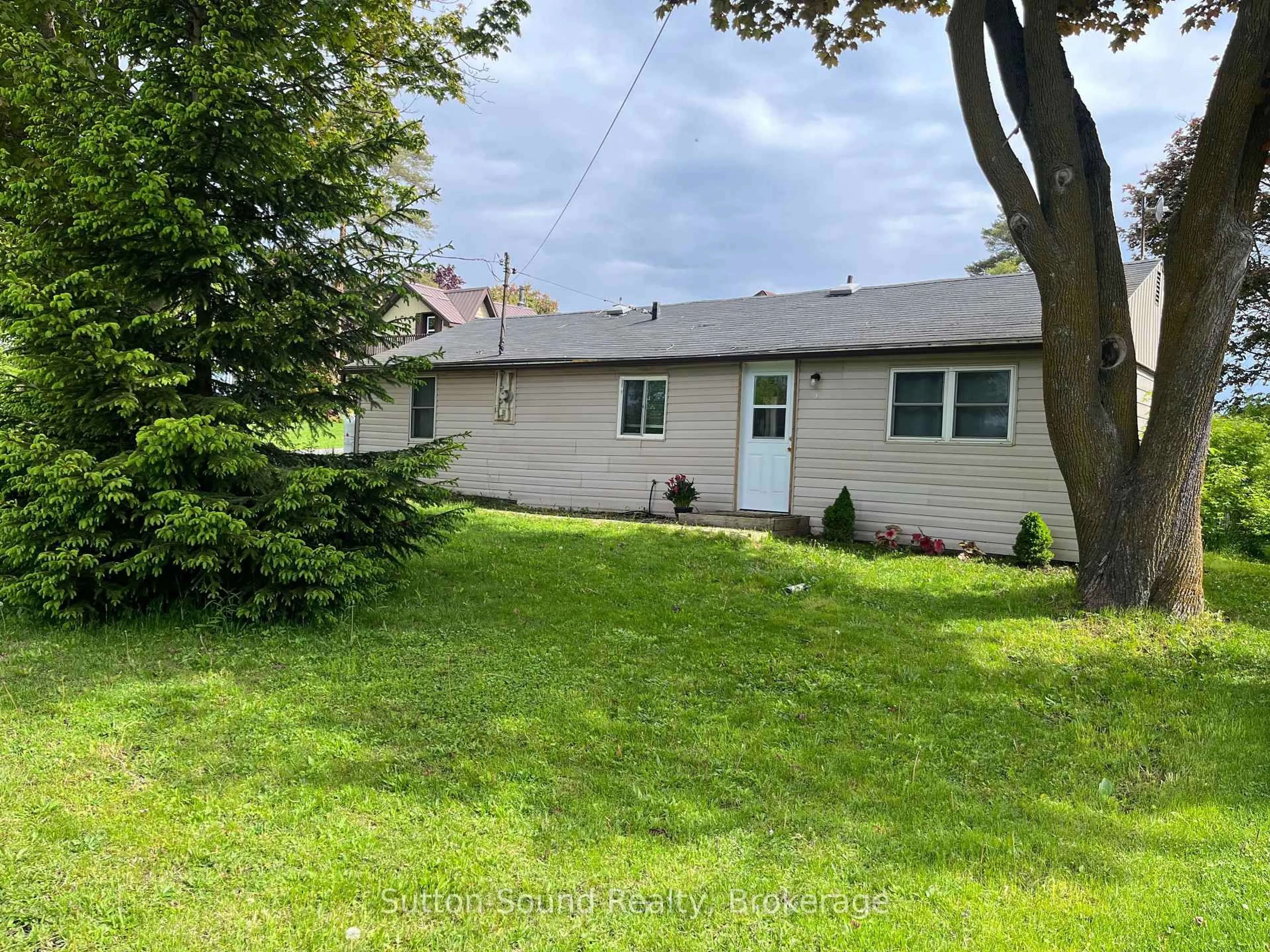A pic from outside/outdoor area/front of a property/back of a property/a pic from drone, street for 776225 Highway 10 Highway, Chatsworth Ontario N0H 1C0