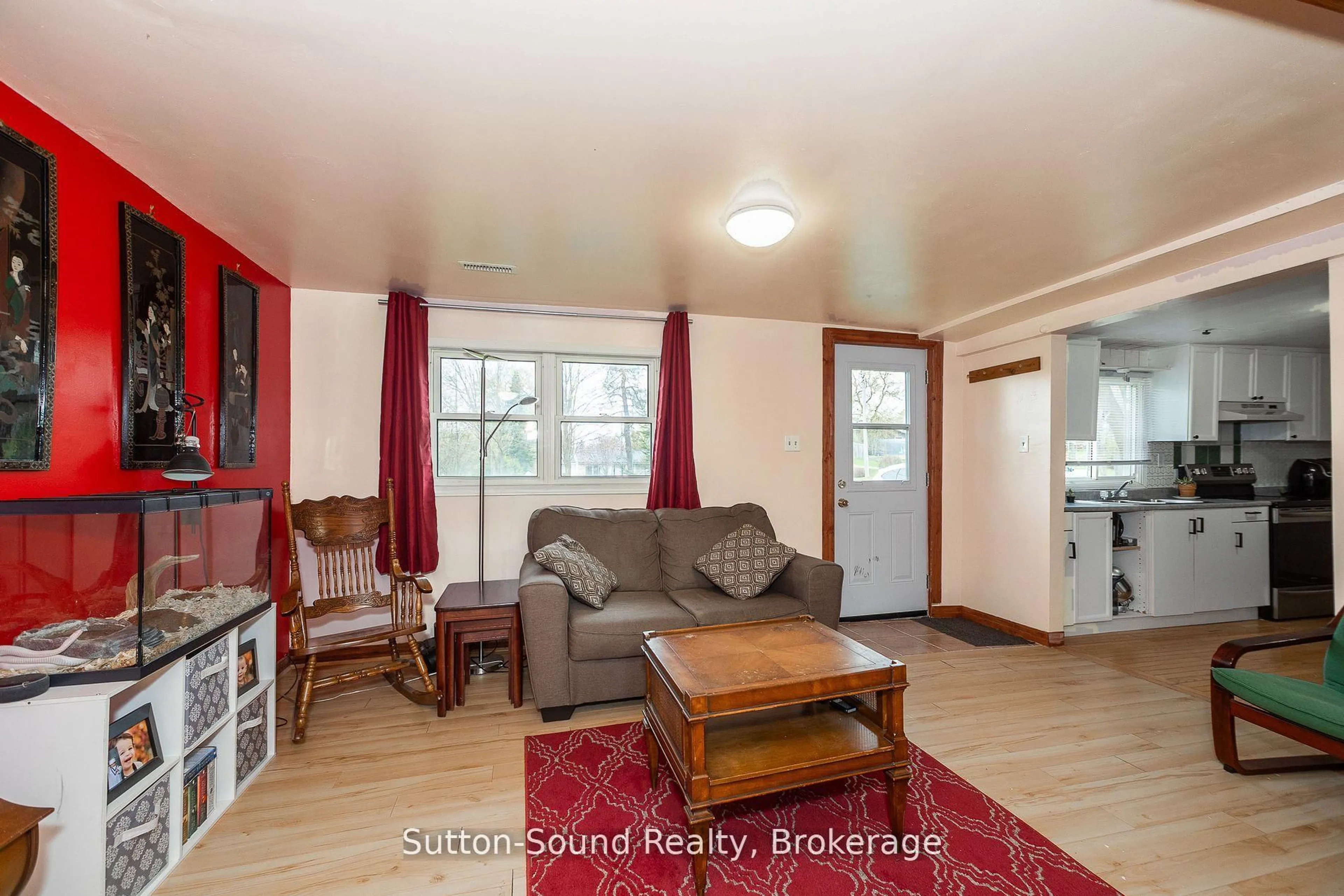 Living room with furniture, wood/laminate floor for 776225 Highway 10 Highway, Chatsworth Ontario N0H 1C0