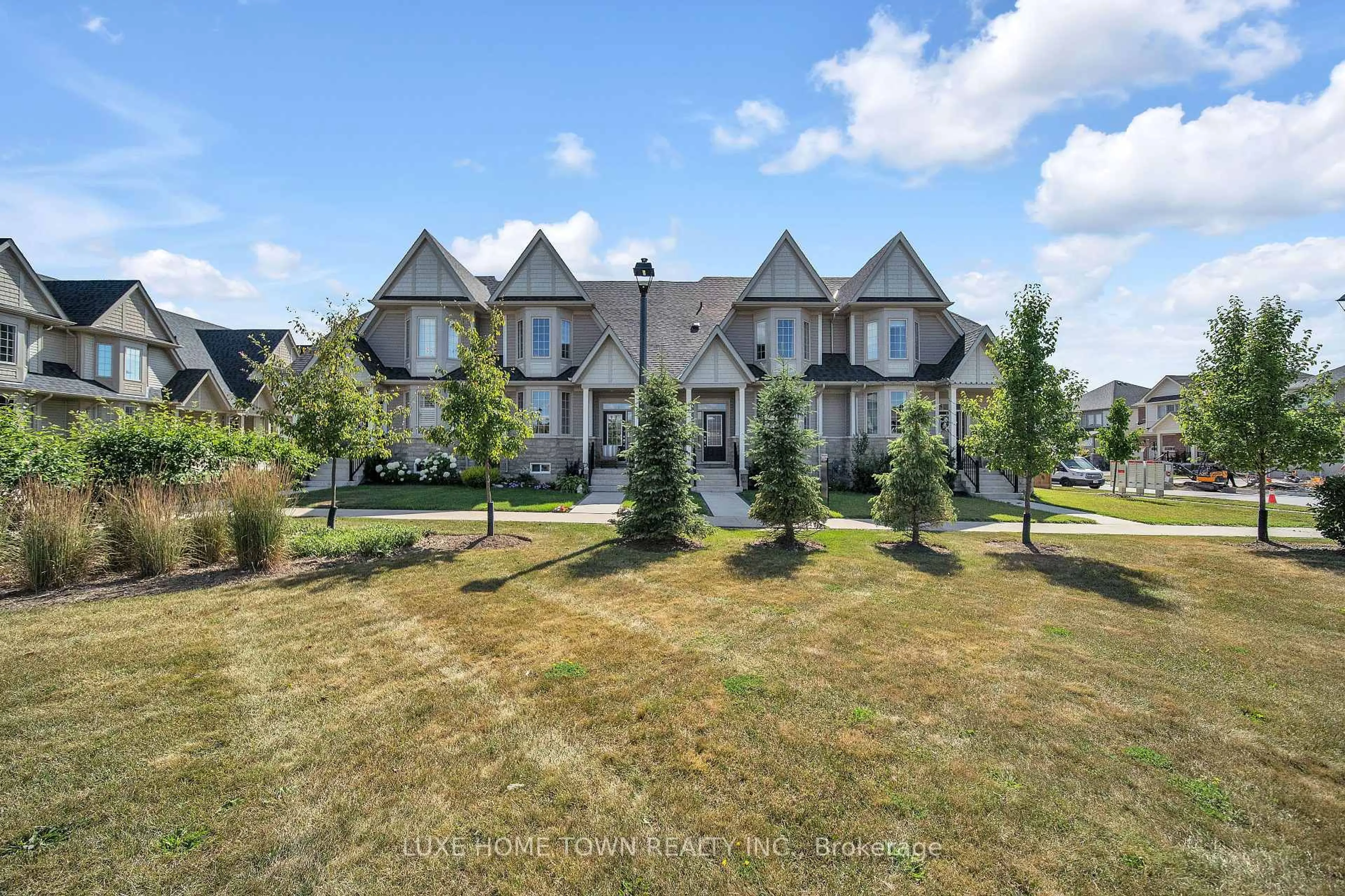 A pic from outside/outdoor area/front of a property/back of a property/a pic from drone, street for 25 Elliot Ave #2, Centre Wellington Ontario N1M 0H6